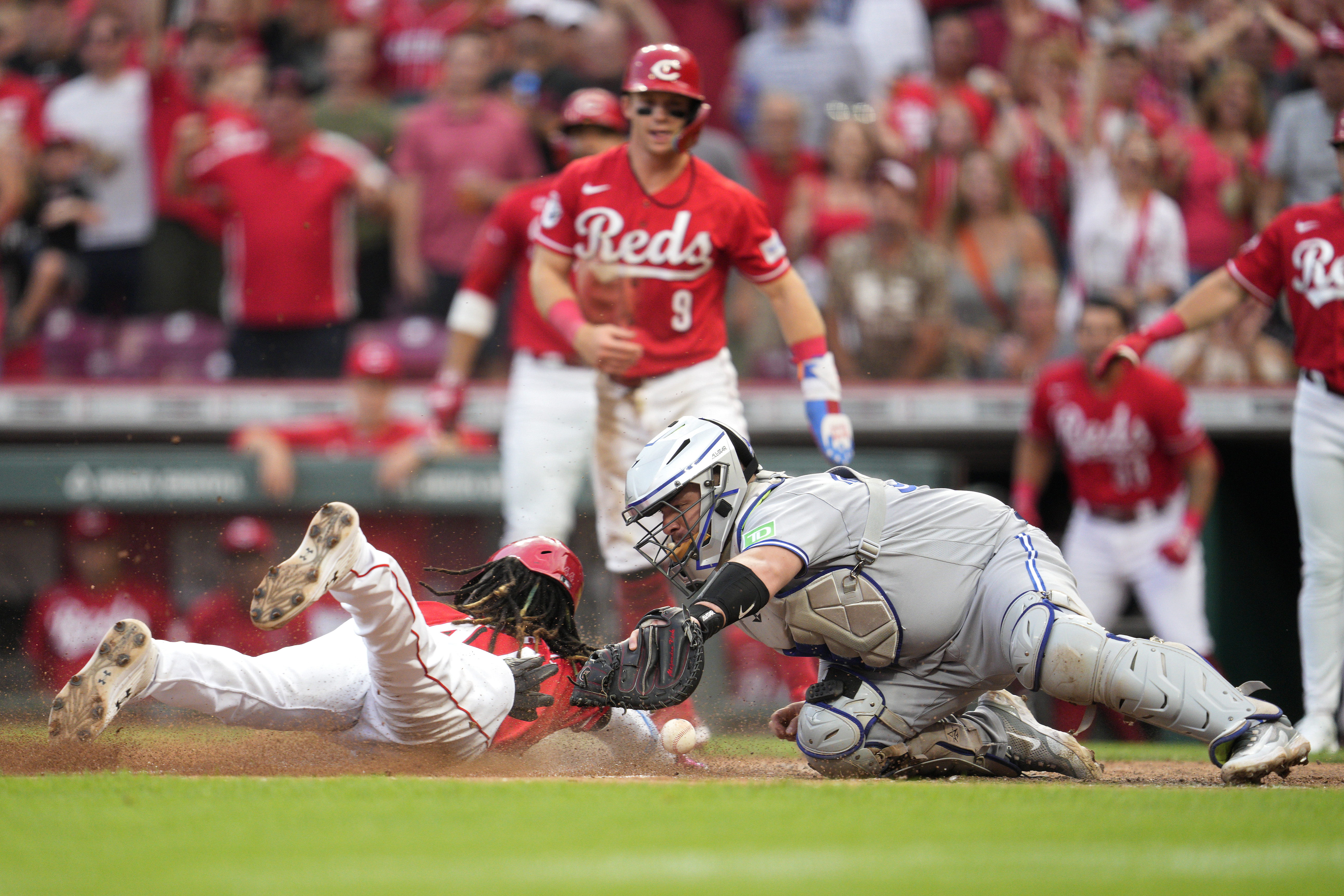 Christian Encarnacion-Strand of the Cincinnati Reds slides in safely  News Photo - Getty Images