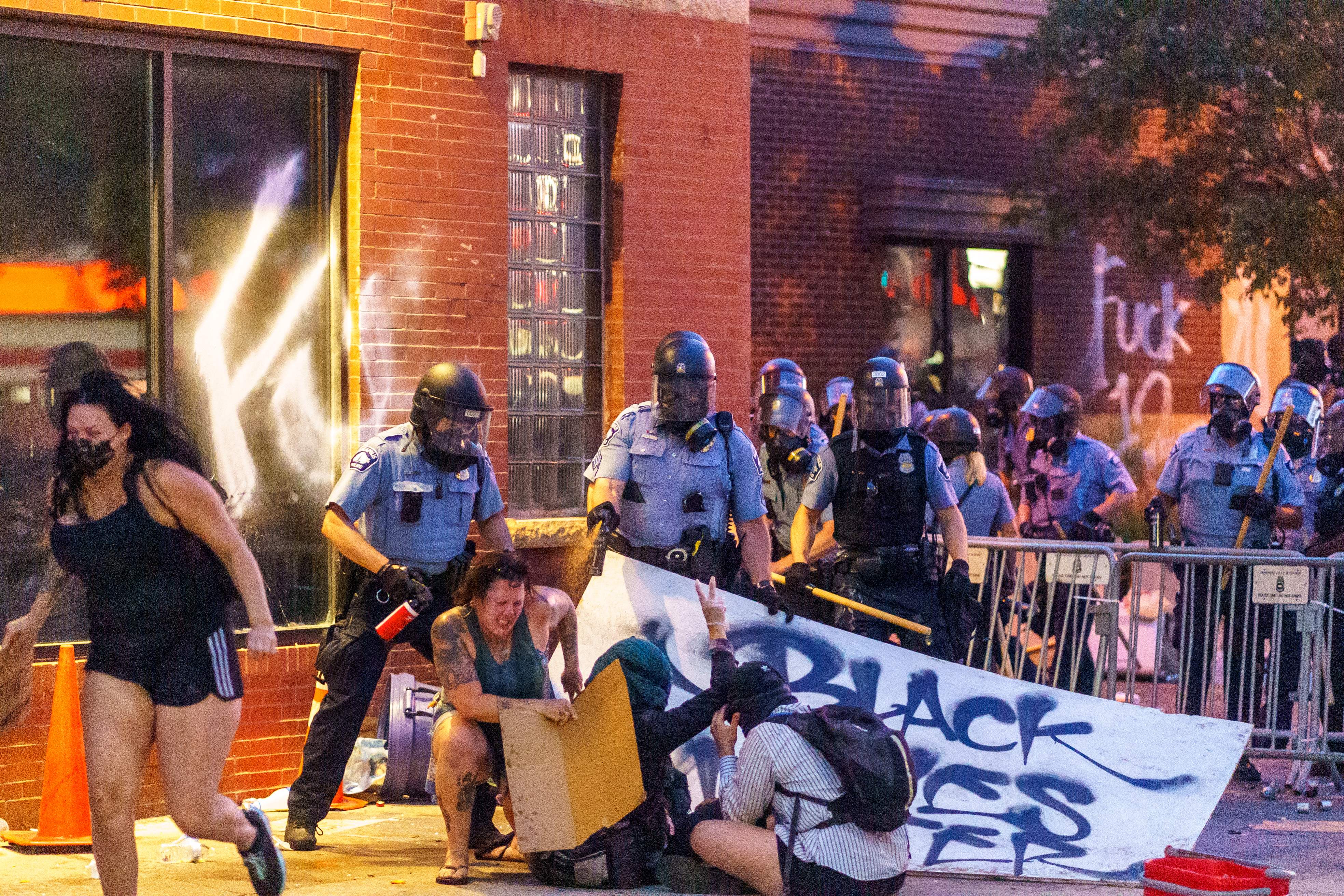 Police sprayed protesters with pepper spray during a demonstration.