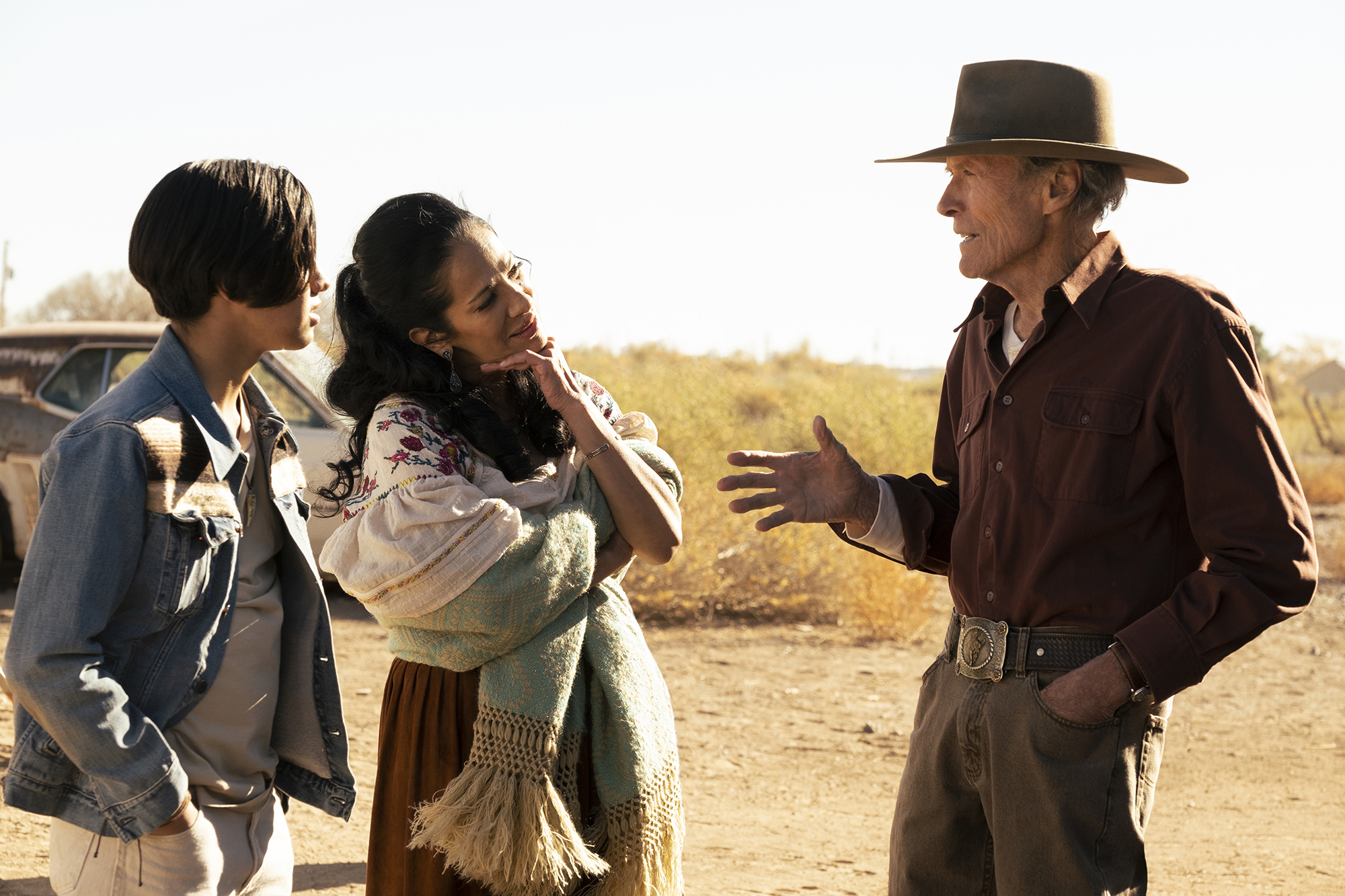 From left: Eduardo Minett, Natalia Traven, and Clint Eastwood in "Cry Macho."