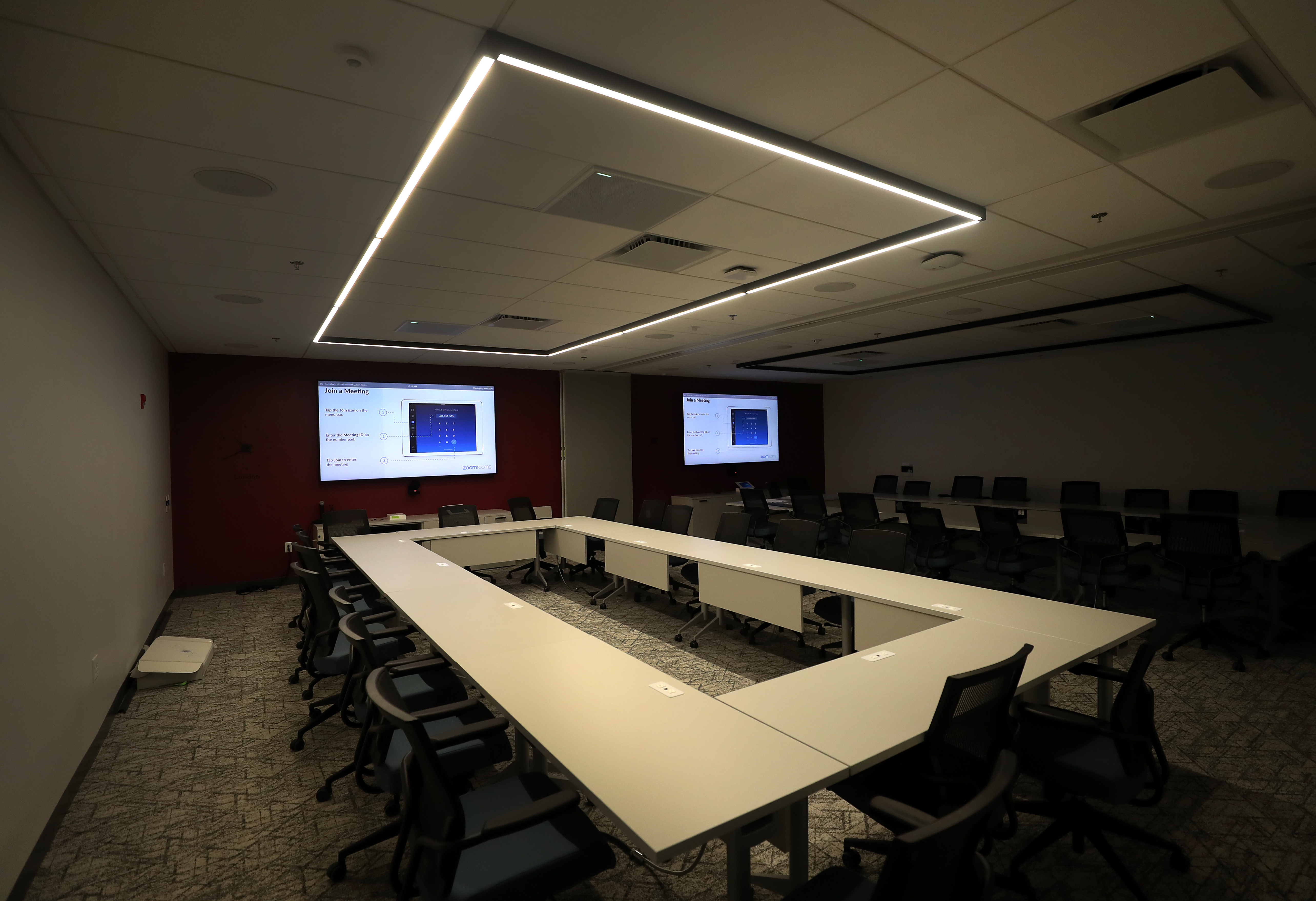 An empty meeting room awaits returning employees at IDG in Needham.