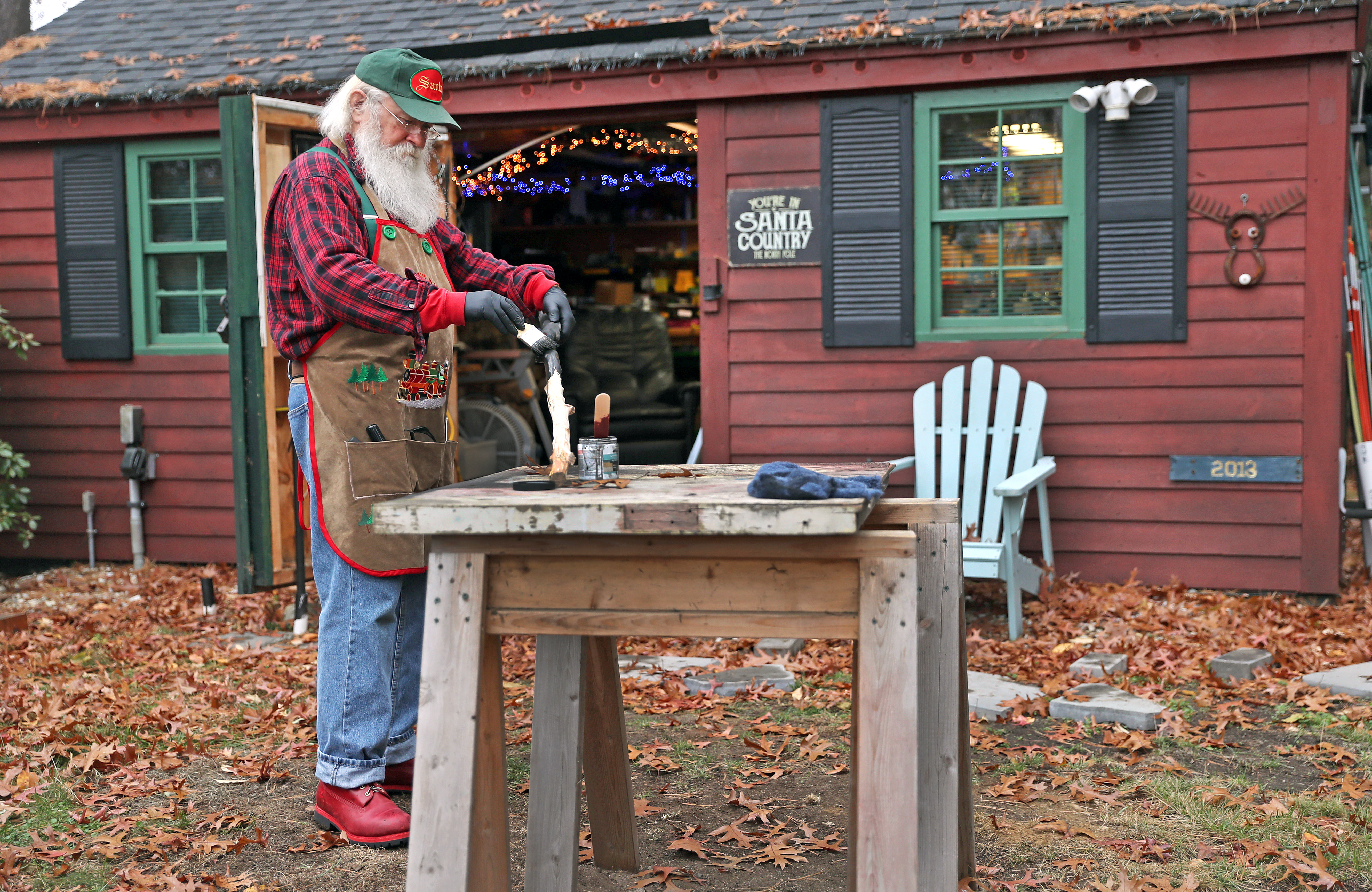 Santa Bob has a workshop set up in a shed behind his Framingham home to make Santa supplies and repairs.