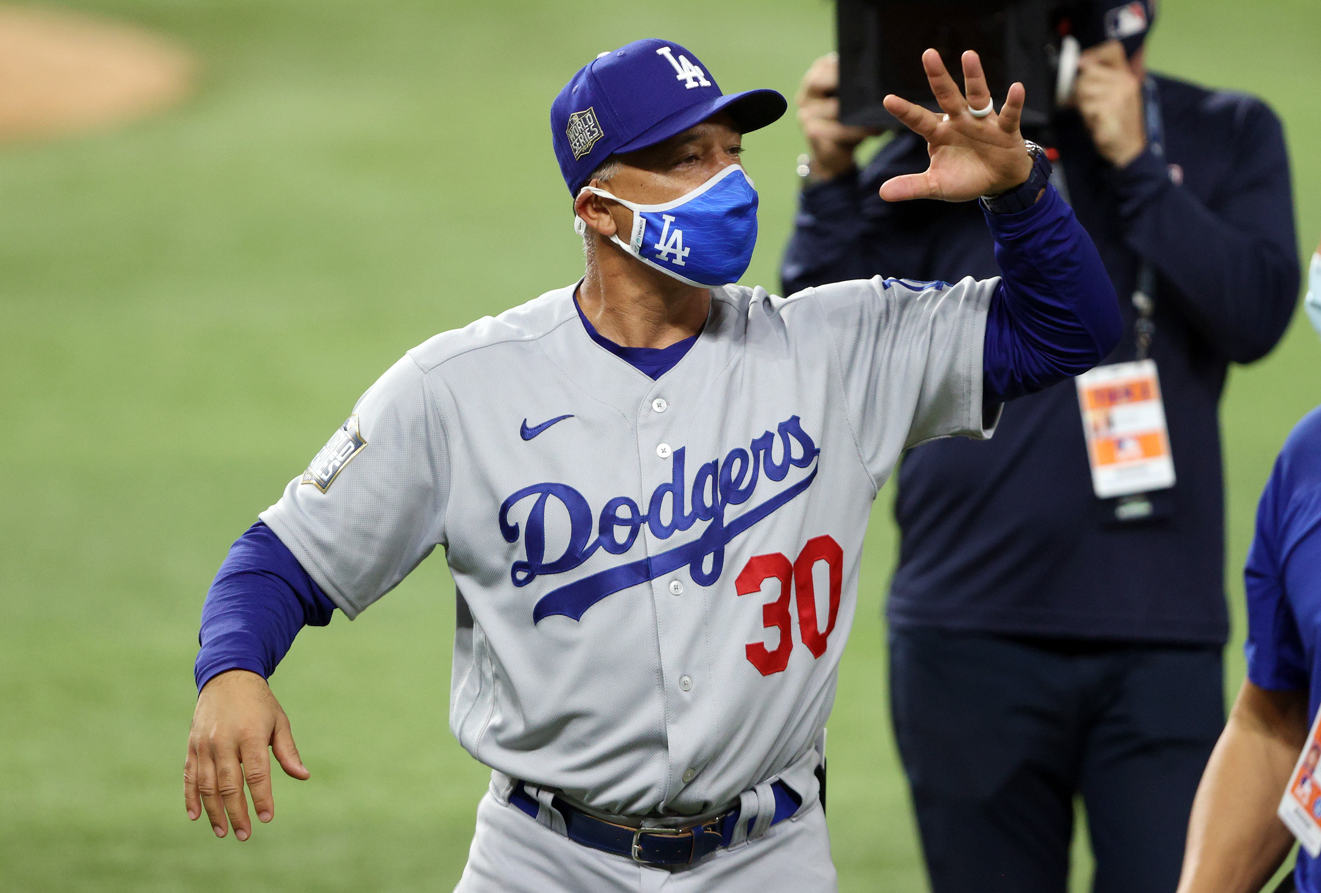 Dave Roberts wants to check out of bubble as a World Series champ: 'We're  ready to make our our own mark on Dodgers history' - The Boston Globe