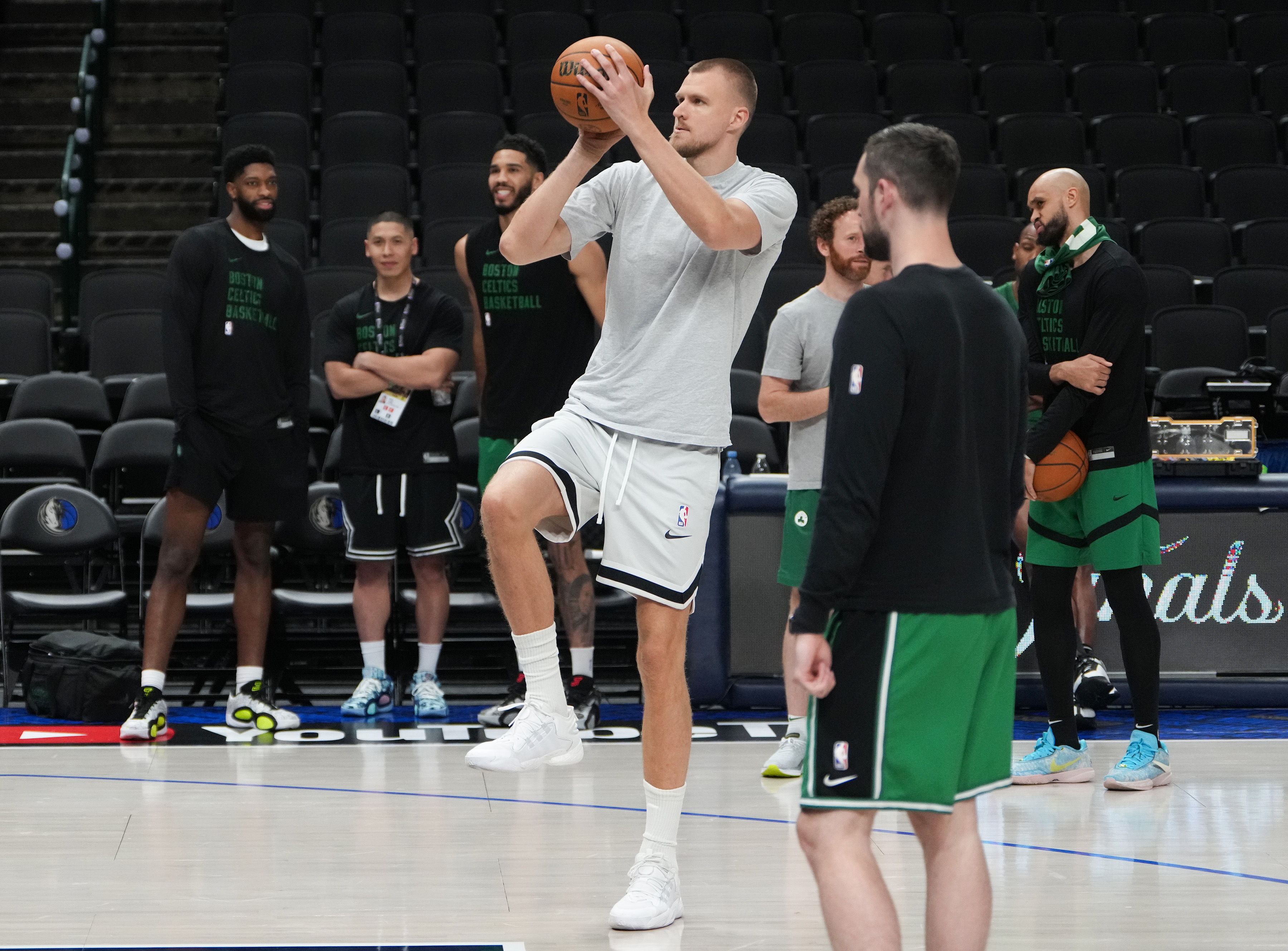 Kristaps Porzingis takes the floor for Celtics practice but