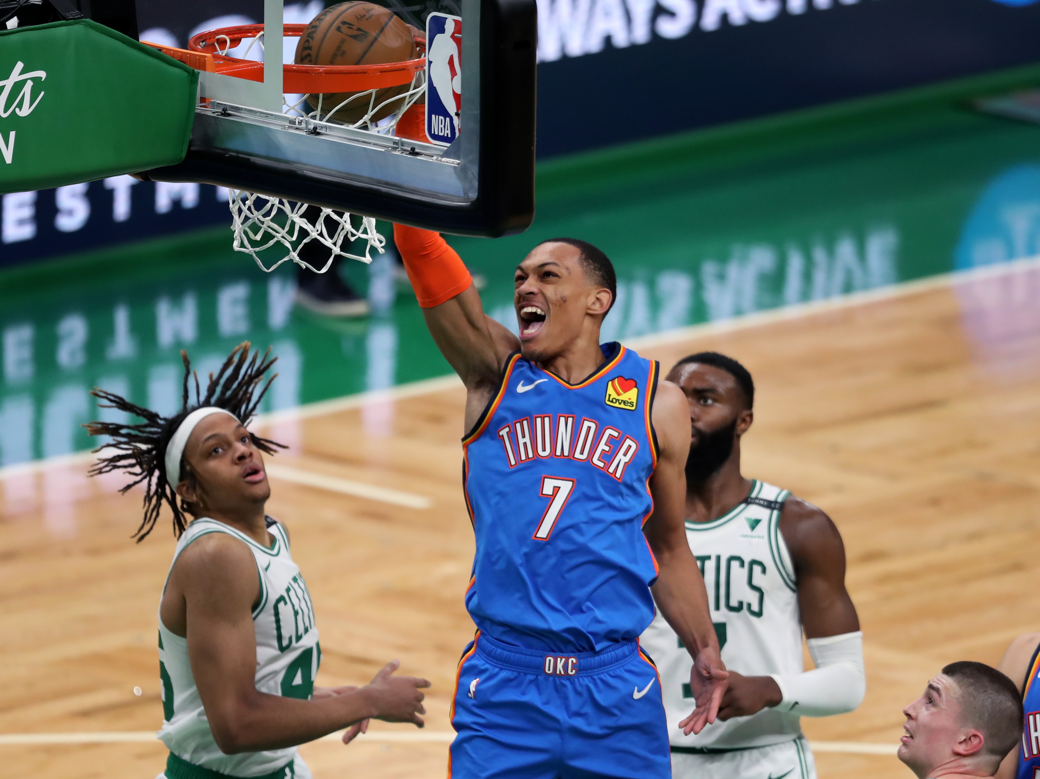 There was little defensive intensity Tuesday night from the Celtics -- here, Romeo Langford, Jaylen Brown and Payton Pritchard look on as Oklahoma City's Darius Bazley flies to the basket.