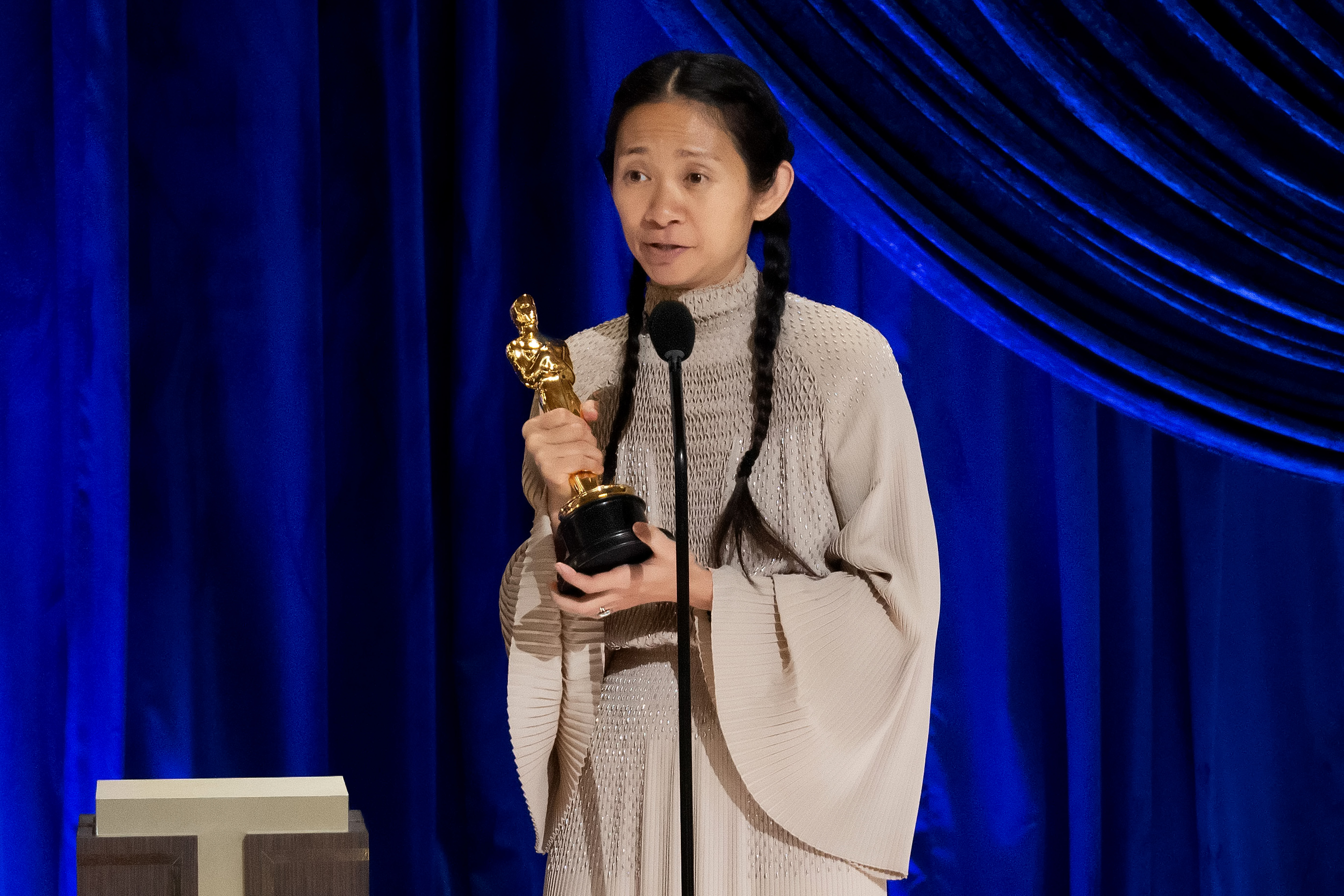 Chloé Zhao accepts the Academy Award for best director.