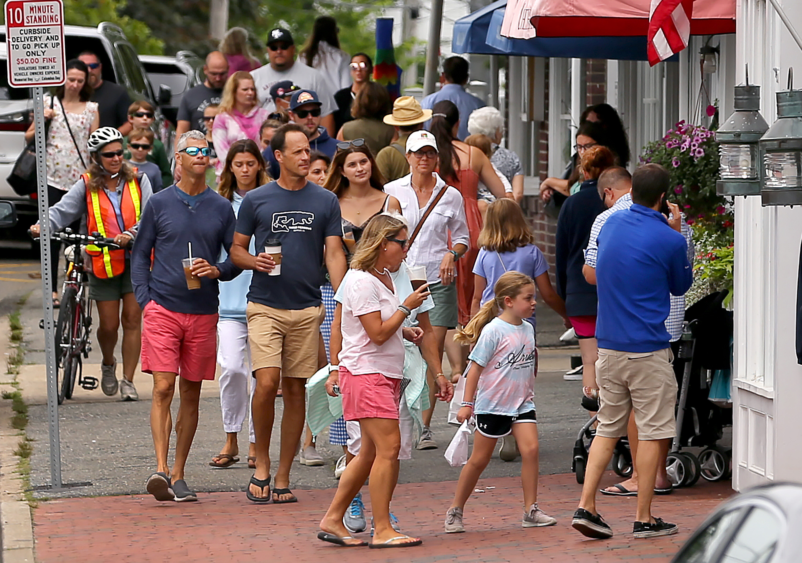 People filled the sidewalk on Main Street in Chatham on a non-beach day.