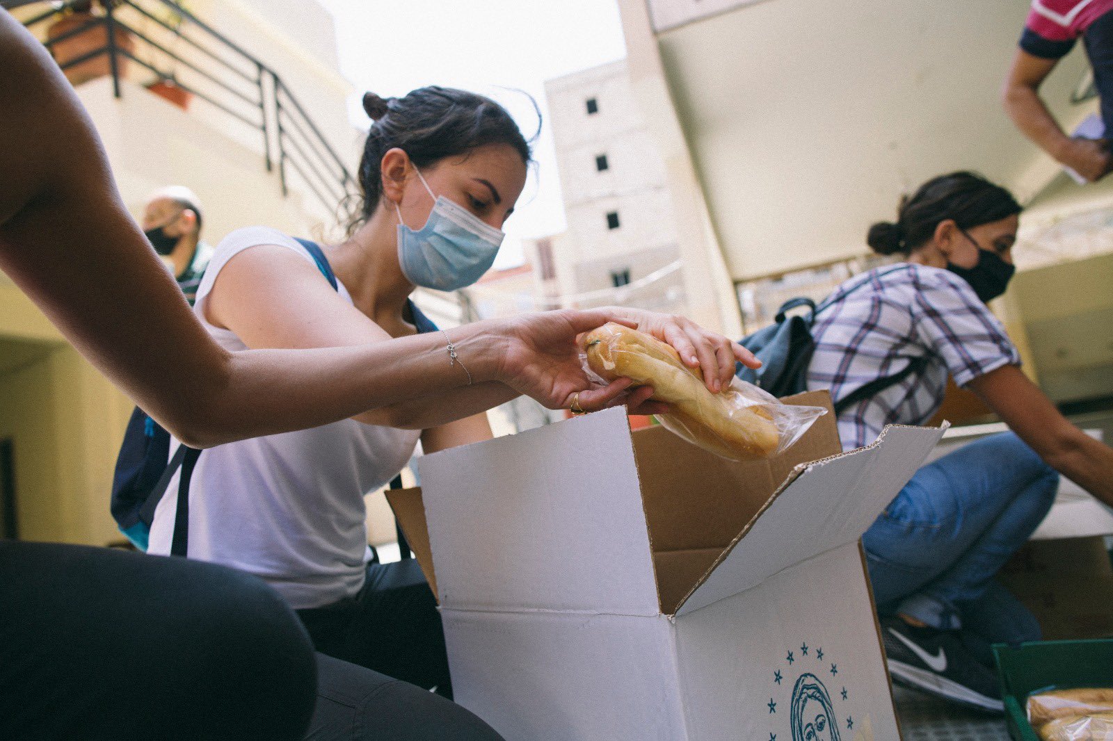 Volunteers pack up sandwiches in Beirut.