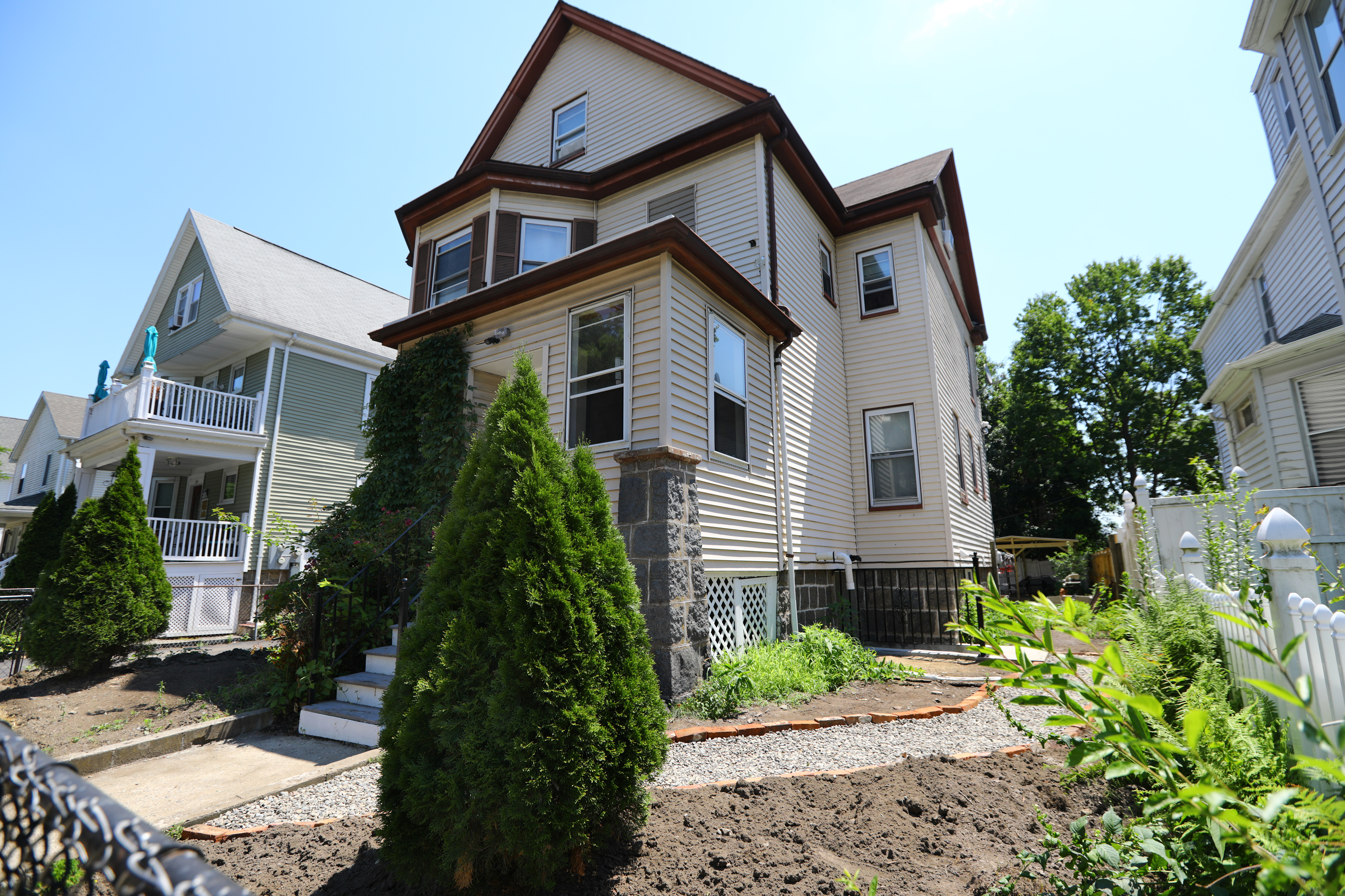 The entrance to the Mattapan ADU apartment at right.