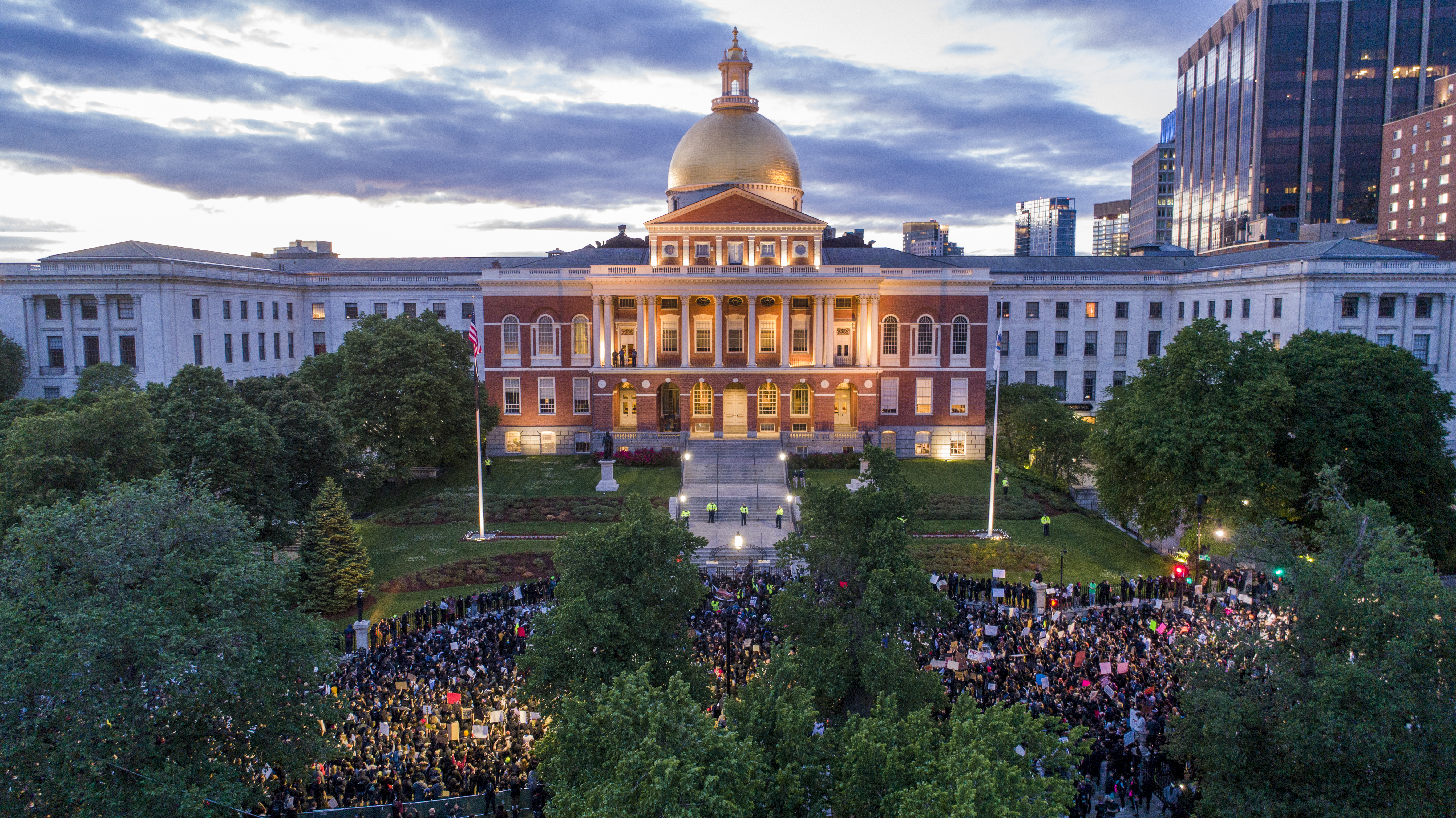 The scene as the sun set on Sunday at the Massachusetts State House.