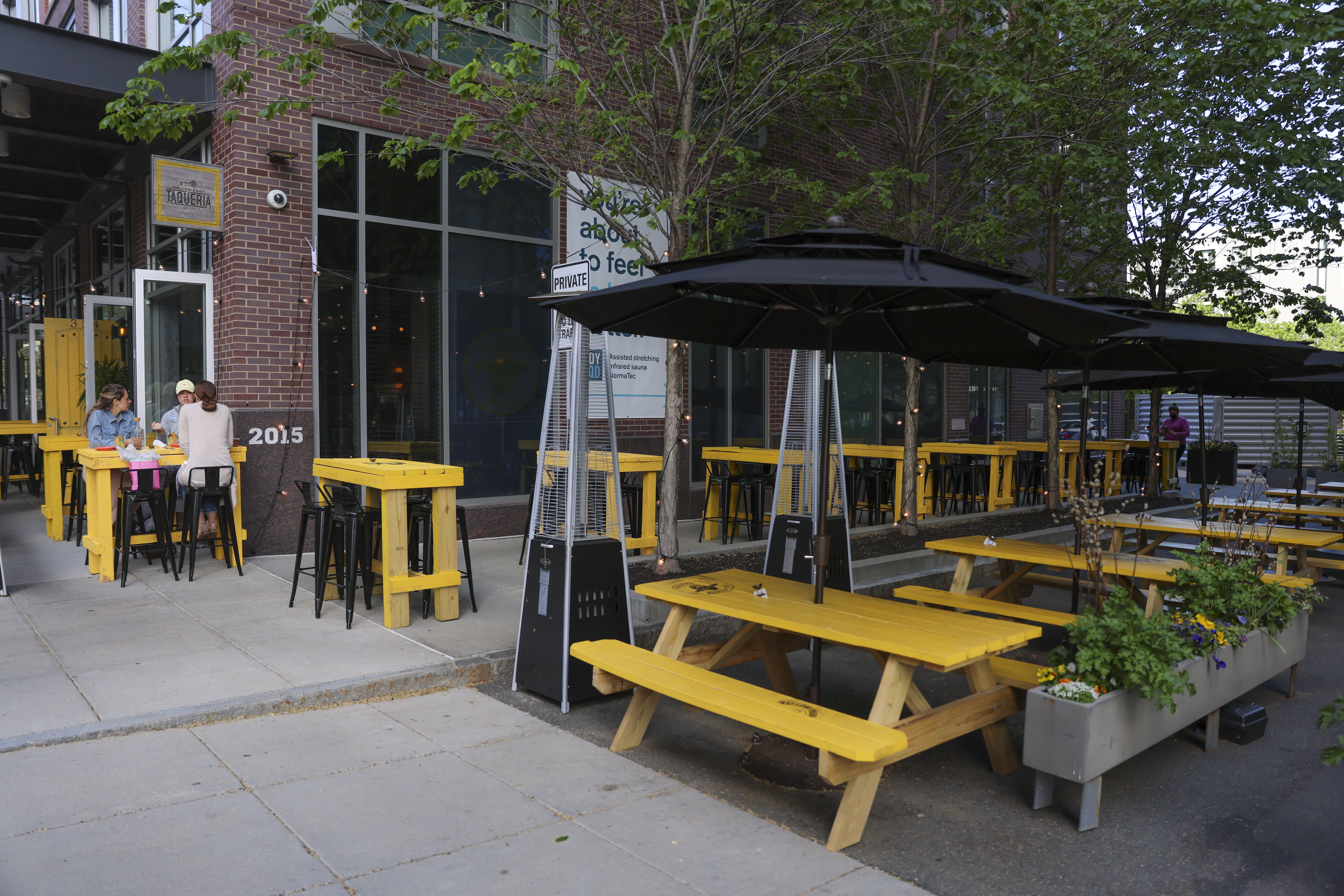 Some of the 14 outdoor tables at Yellow Door Taqueria.