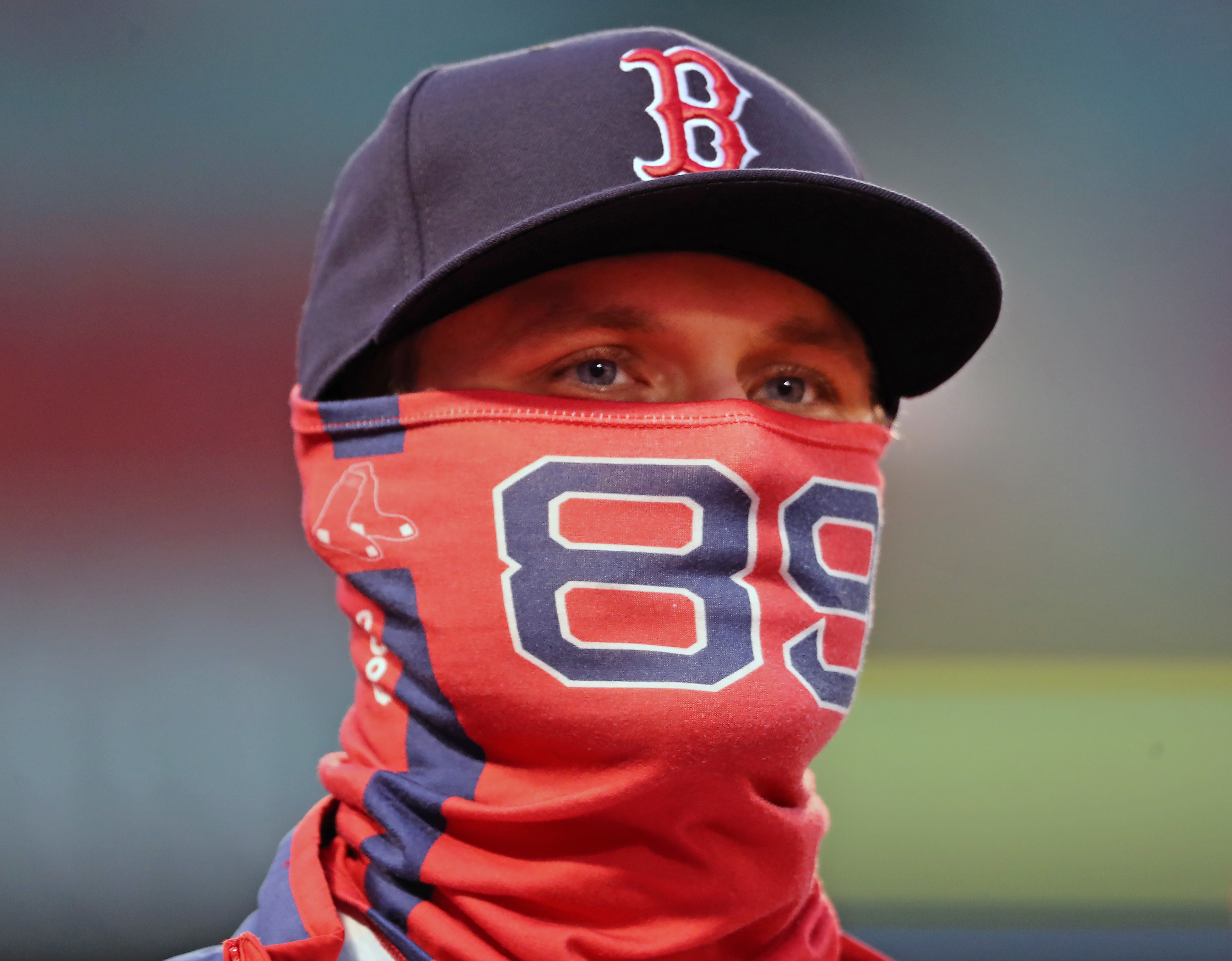 Tanner Houck tries to stay warm before Tuesday's game.