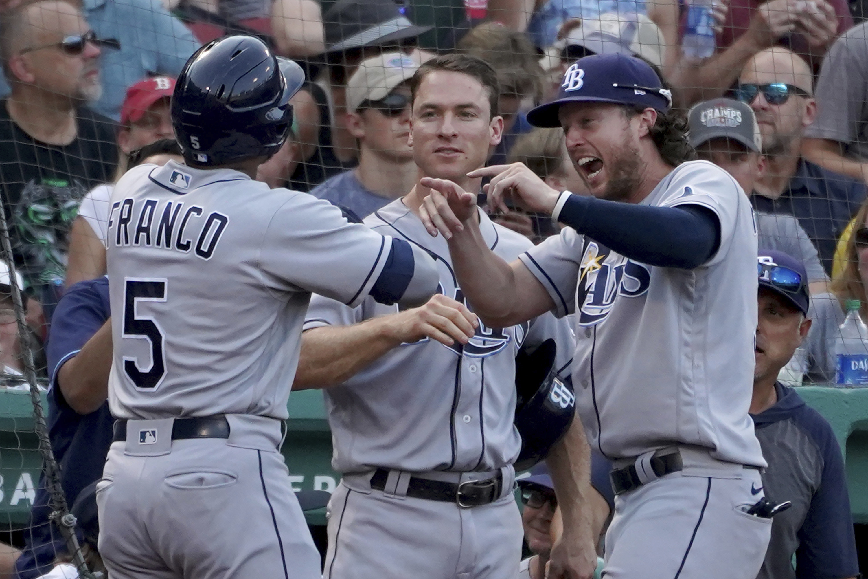 Tampa Bay's Wander Franco is congratulated by Brett Phillips after his strange sixth-inning homer Thursday at Fenway.