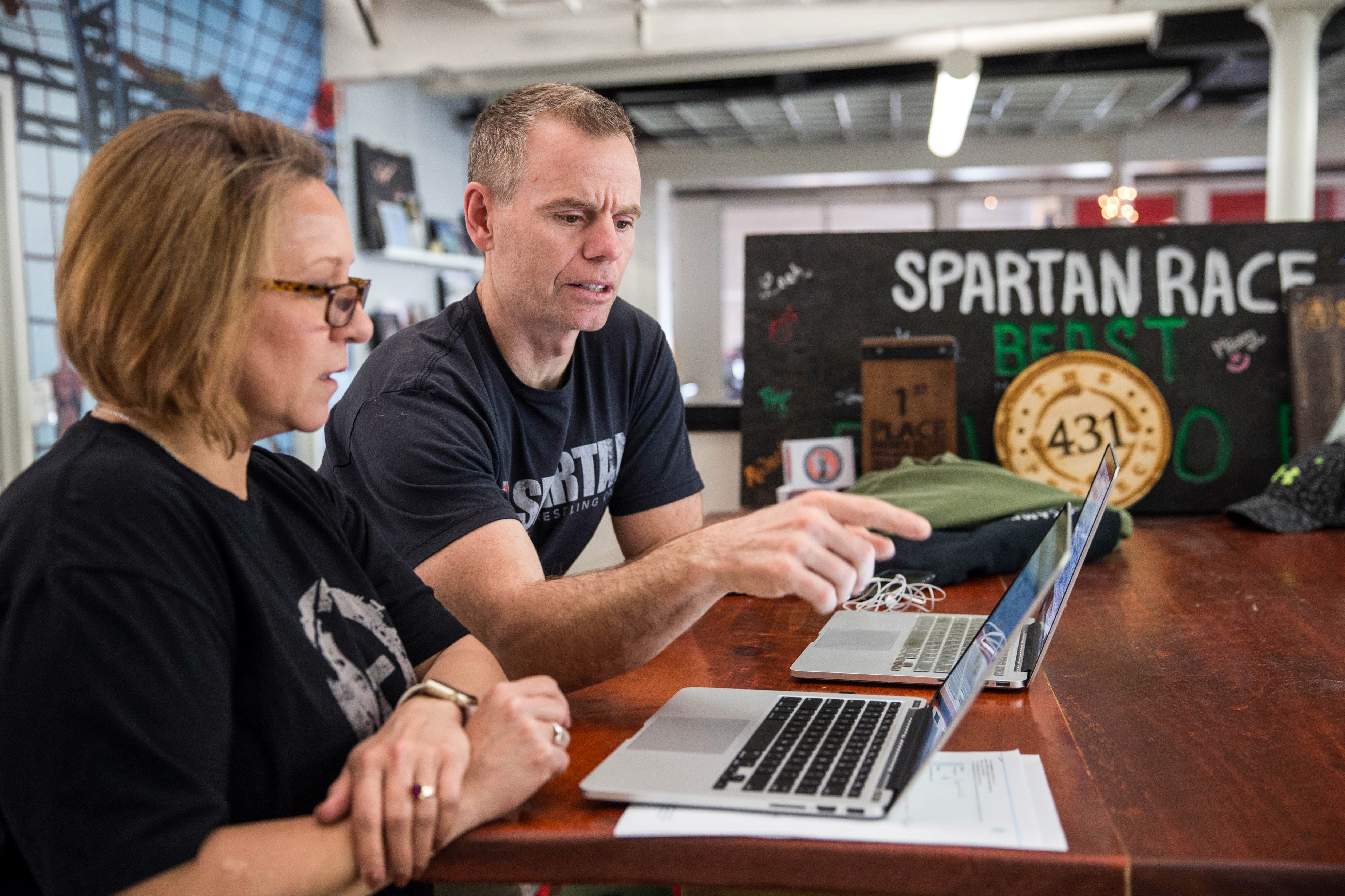 Joe De Sena and chief of staff Hattie Douglas at Spartan headquarters.