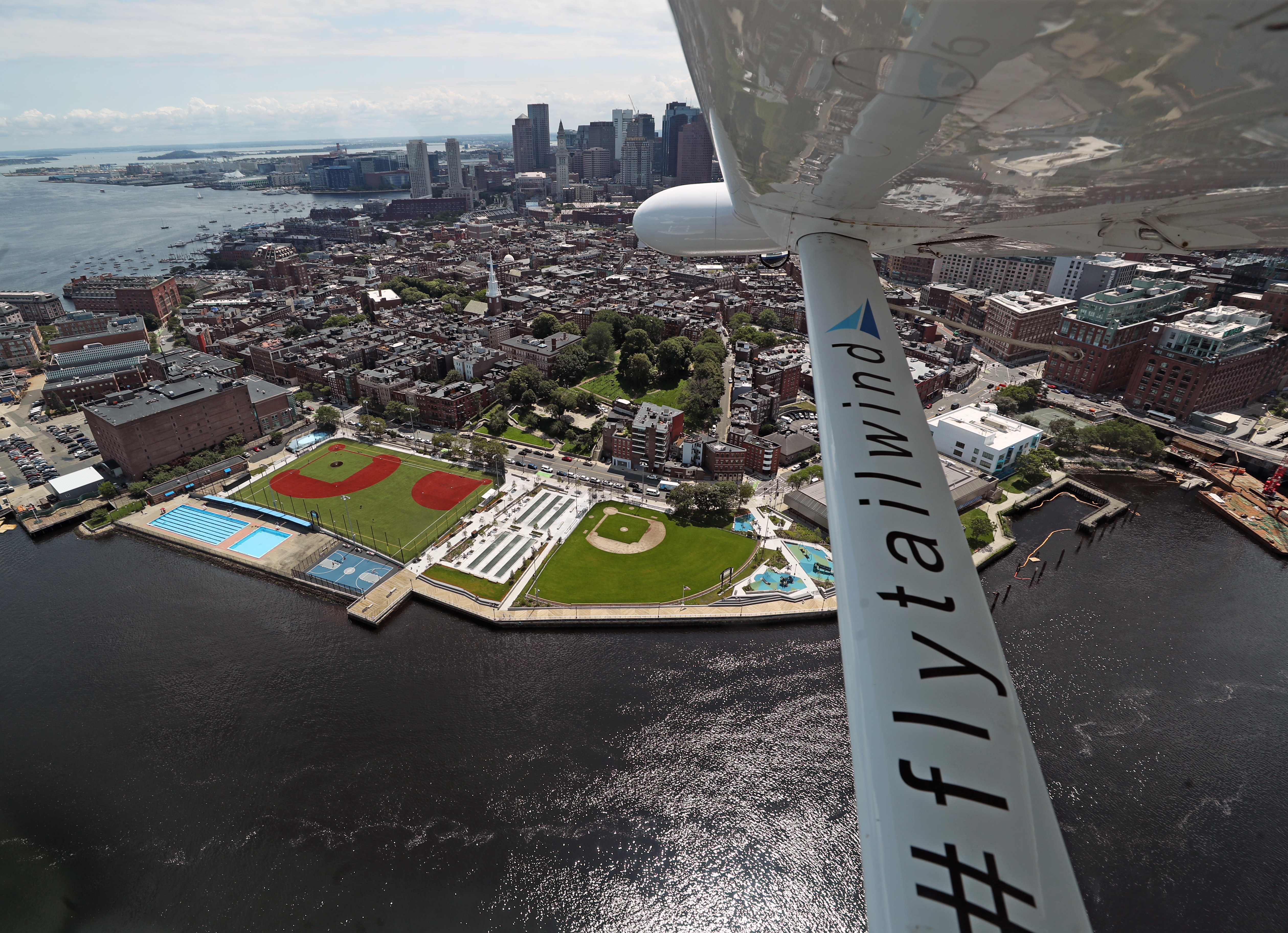 The view from a passenger window of the seaplane mid-flight.