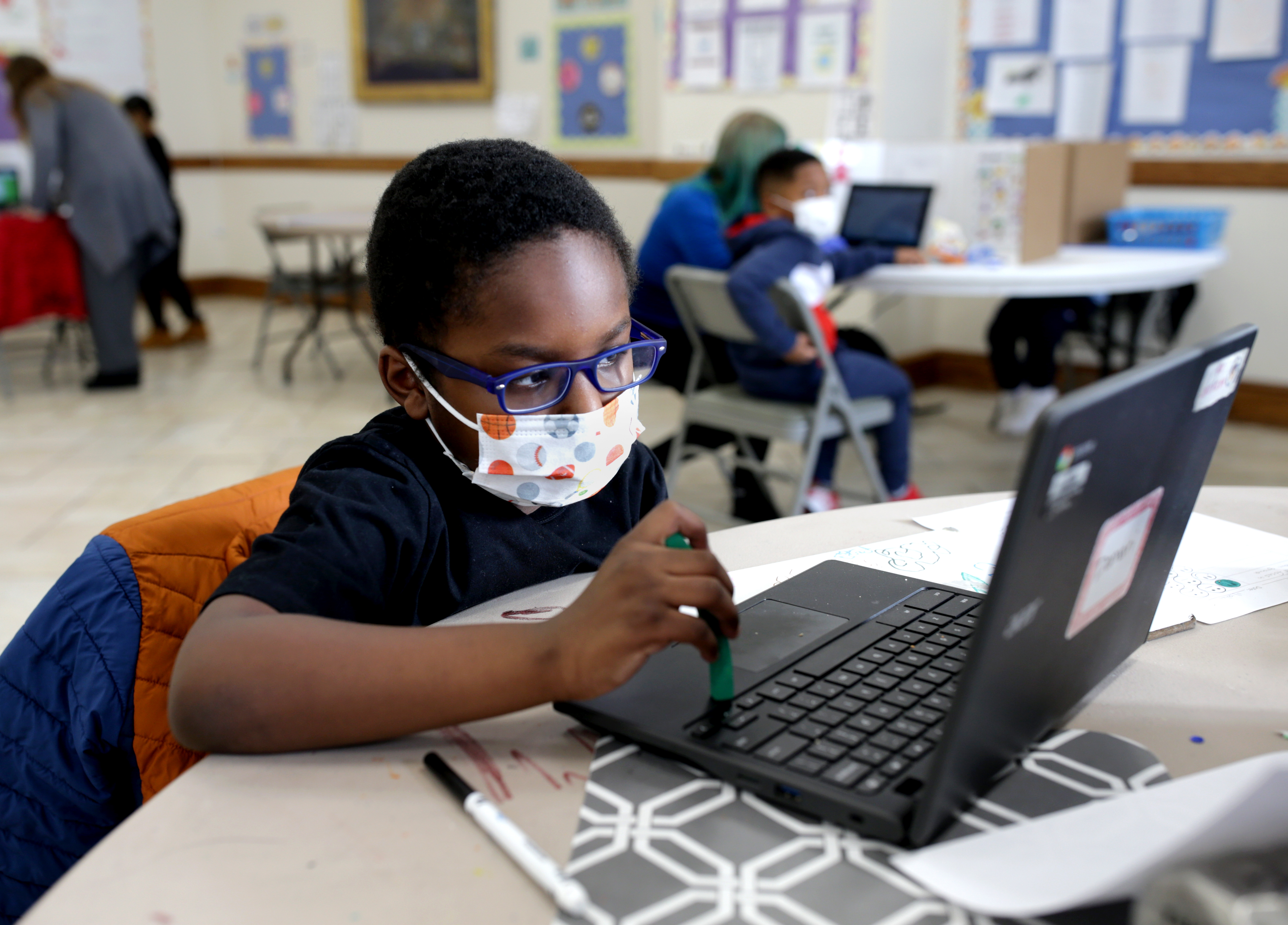 Damarri Sanford did his schoolwork at the Community Learning Collaborative pod.