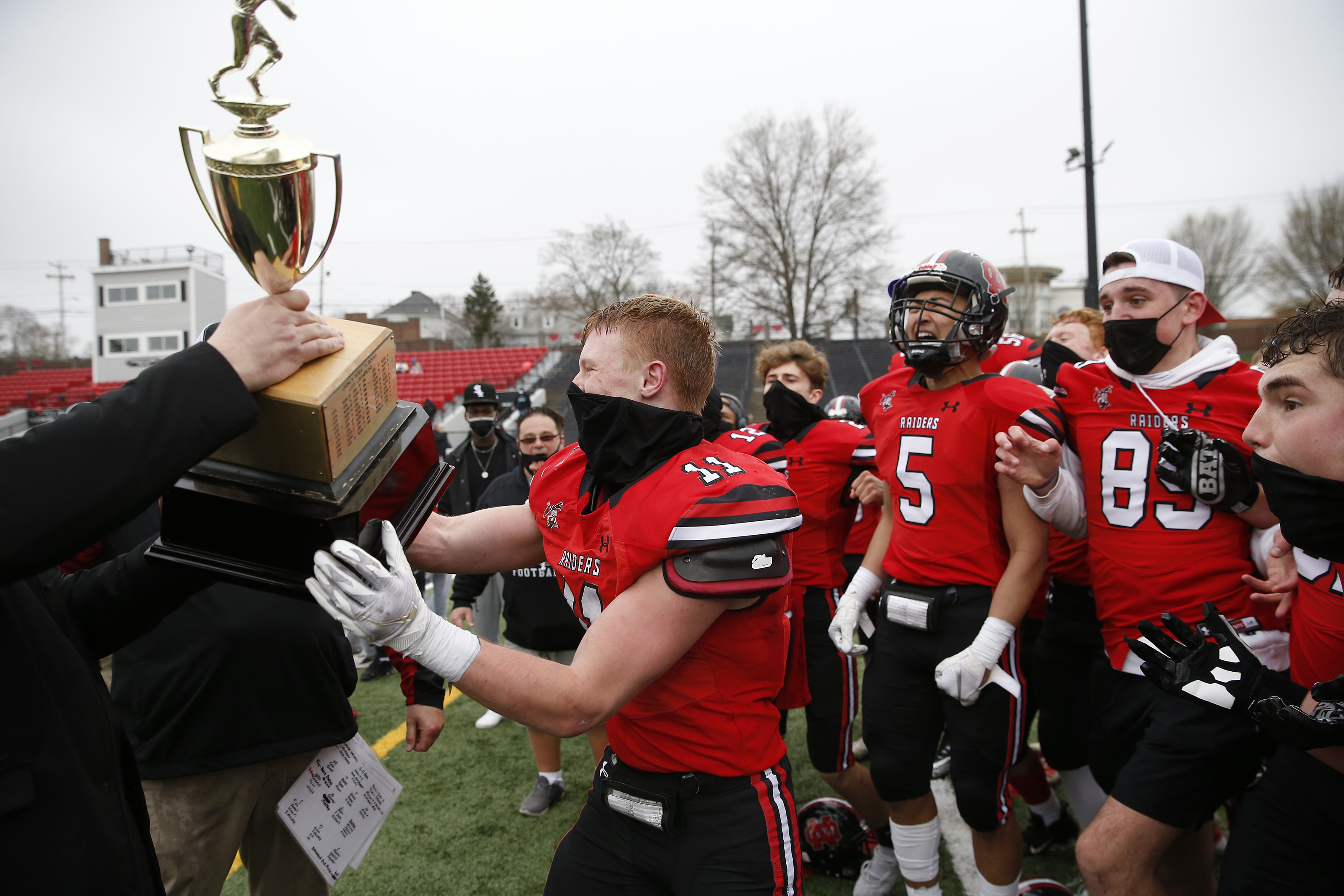 Quincy football defeats North Quincy in 90th Thanksgiving Day game