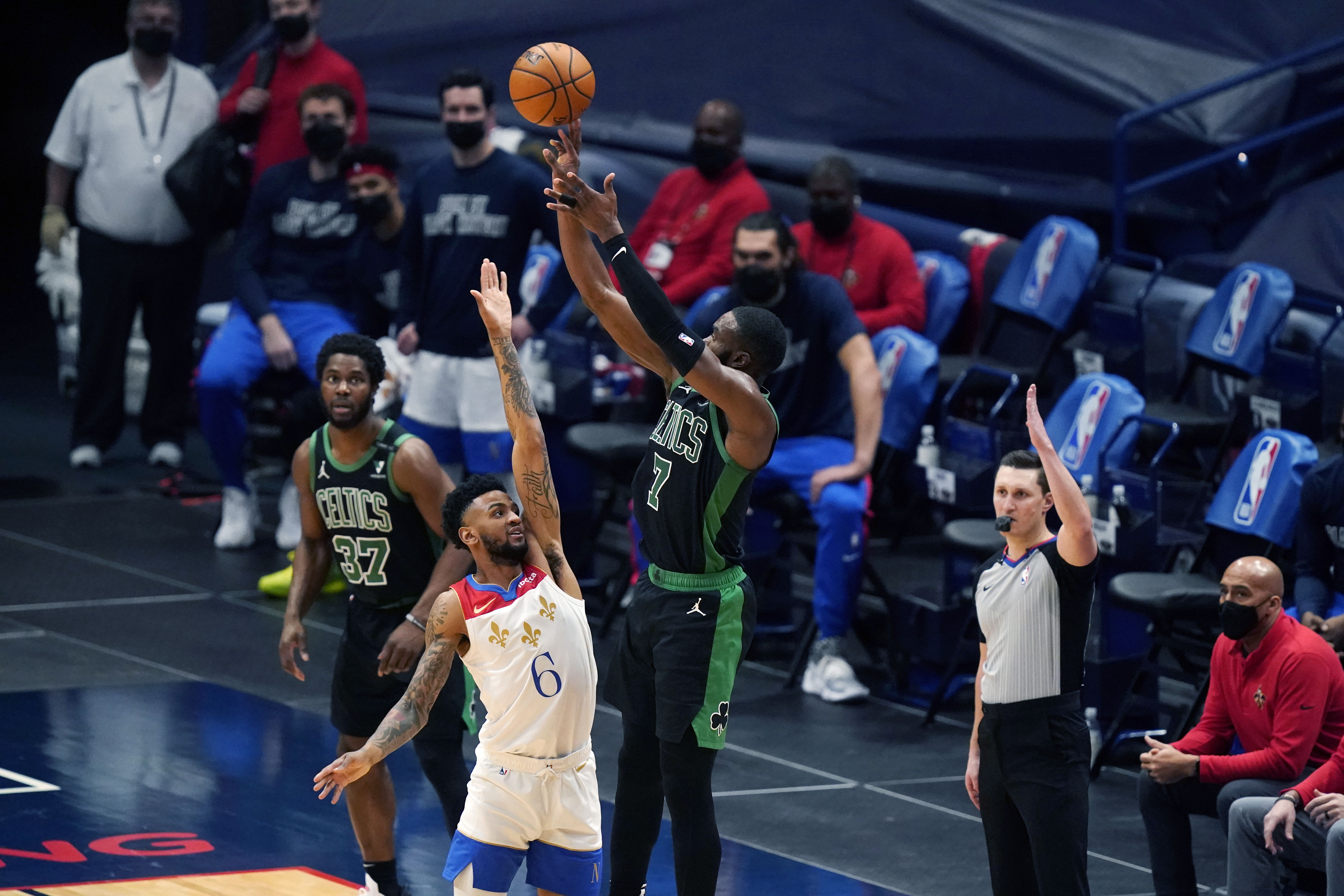Jaylen Brown shoots over New Orleans guard Nickeil Alexander-Walker in the first half of Sunday's game.
