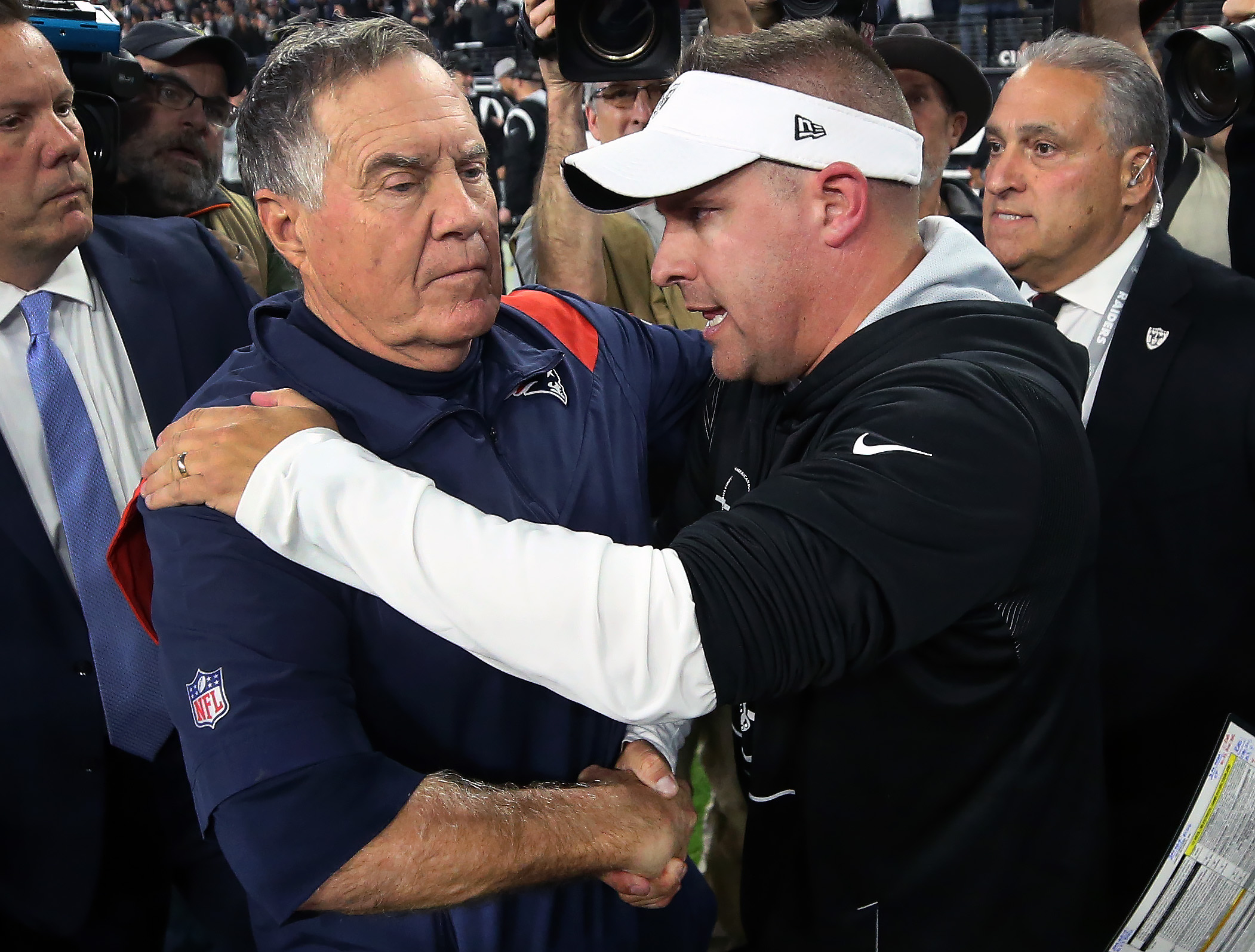 Head Coach Josh McDaniels talks to the media postgame