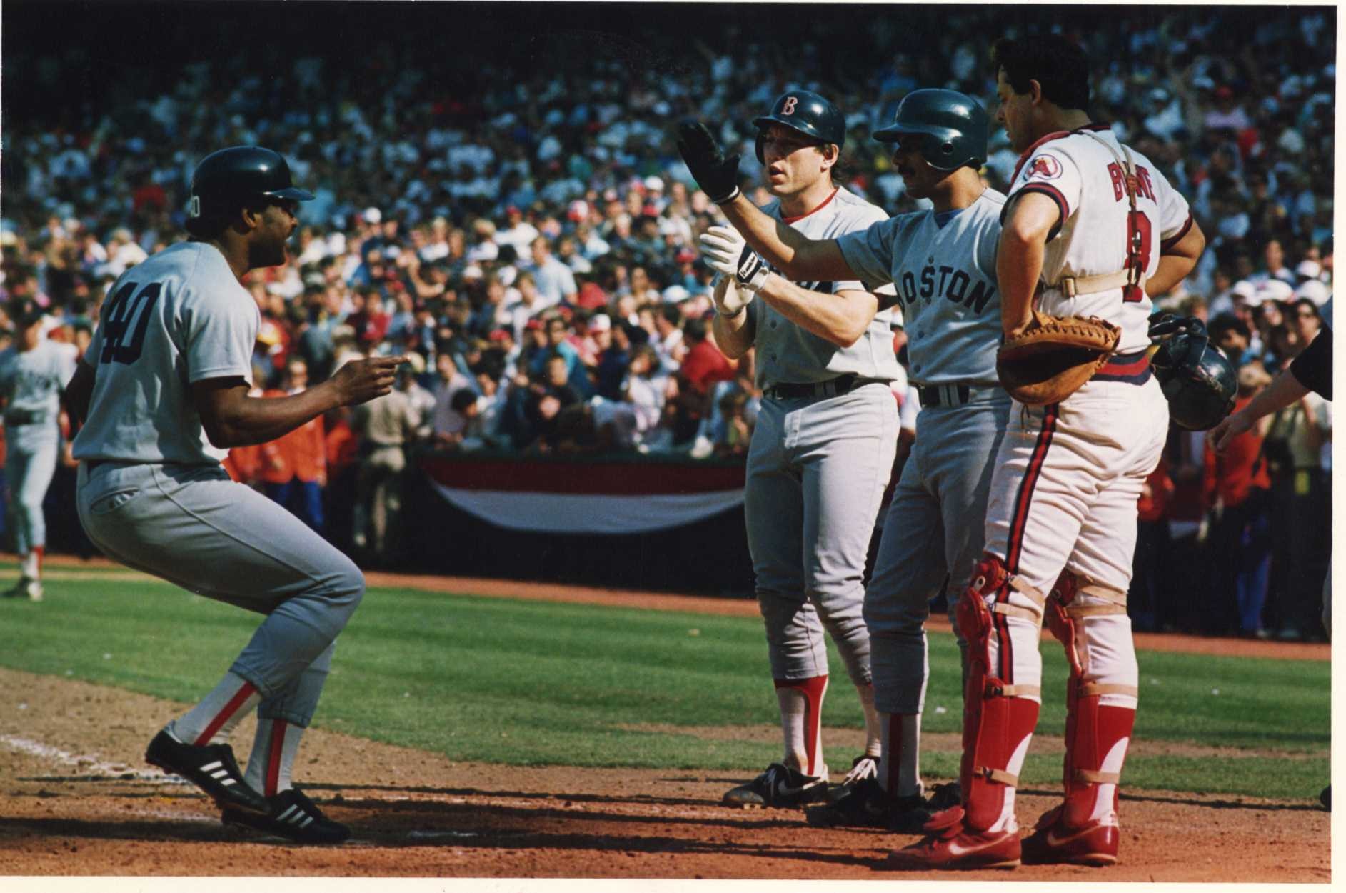 Dave Henderson crosses home plate after his ninth-inning blast against the Angels in Game 5 of the 1986 ALCS.