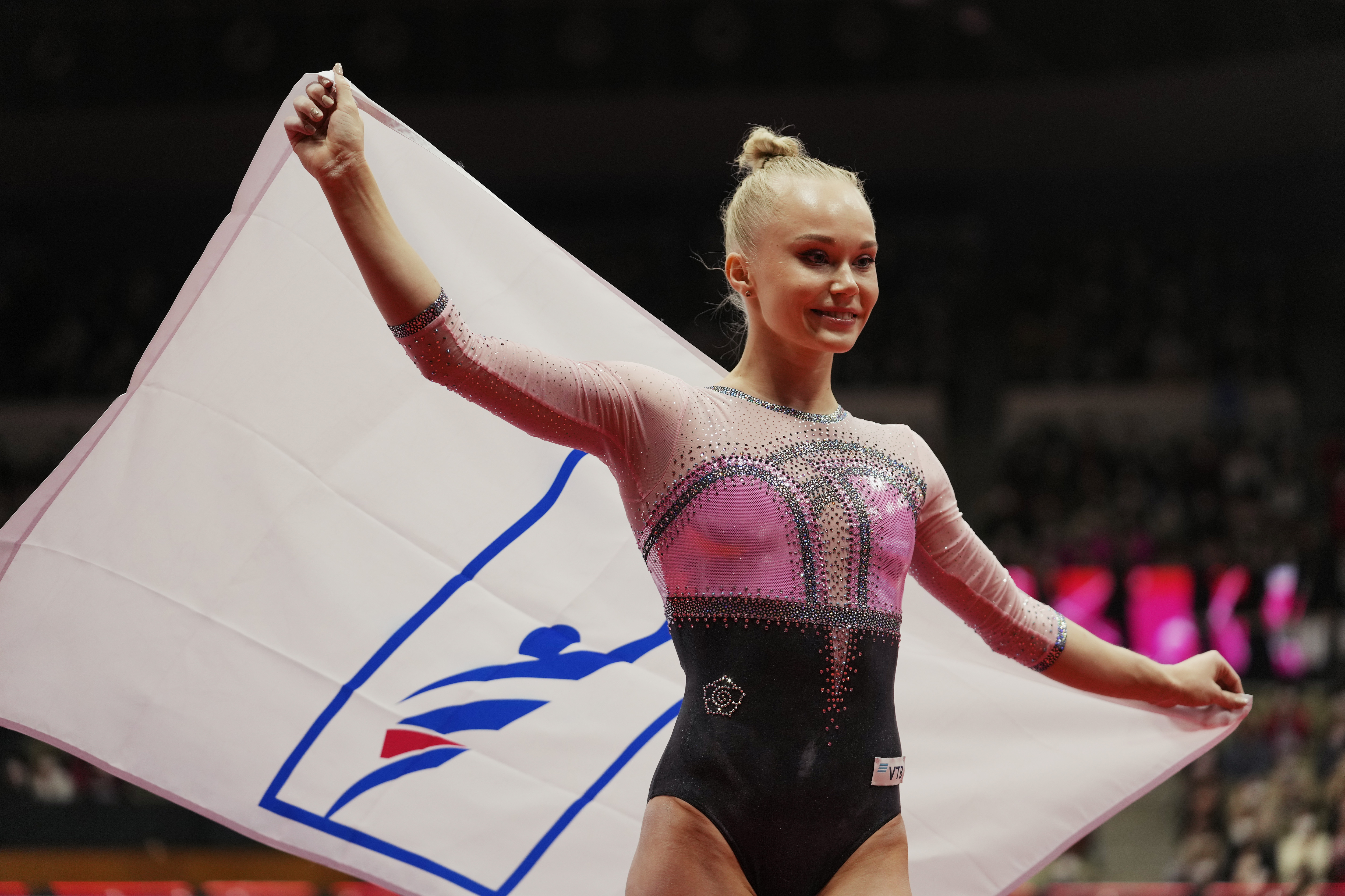 Angelina Melnikova celebrates after winning the gold medal in the all-around finals in the FIG Artistic Gymnastics World Championships Thursday.