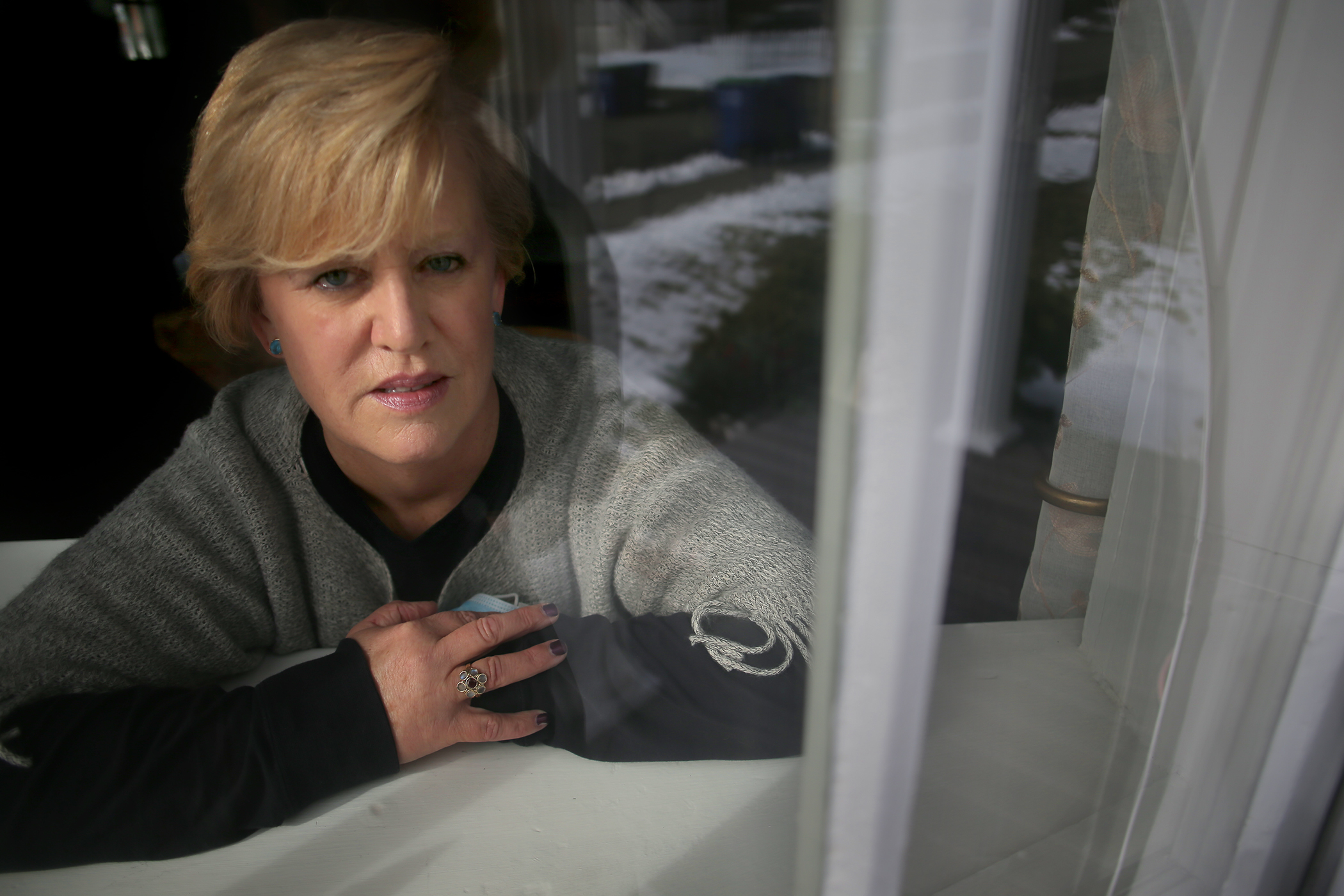 Trish Powers, who leads the nurses union at Brigham and Women's Hospital, has been out of work since testing positive for COVID in December.