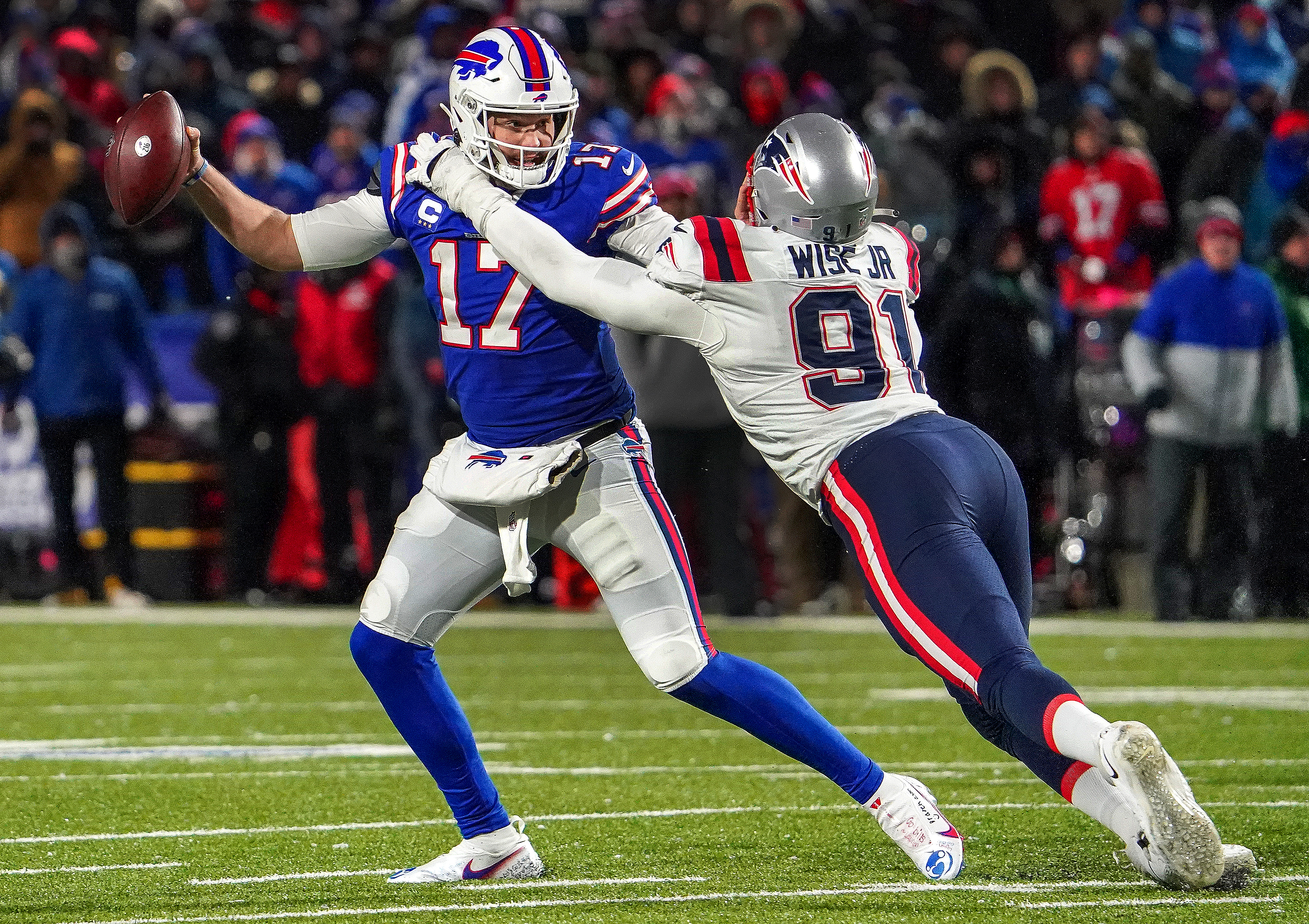 Patriots' defense, running game hold off Bills in bad-weather bowl