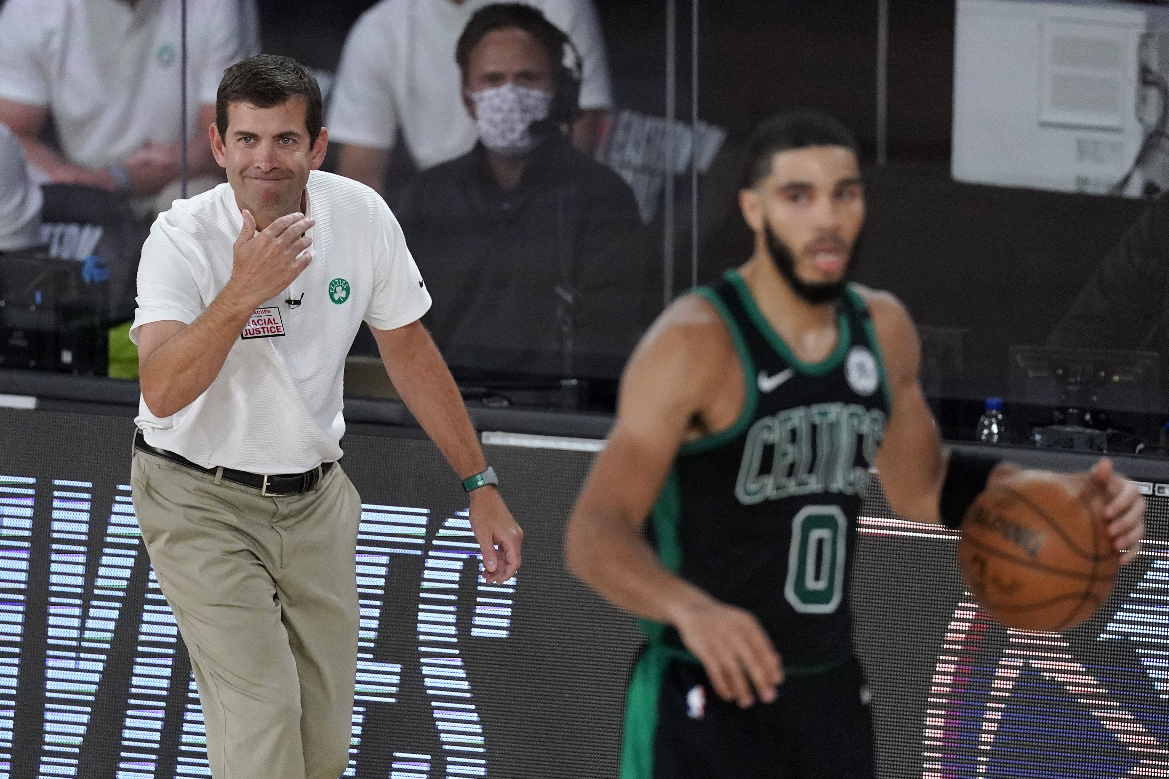 Brad Stevens gestures on the sideline as Jayson Tatum handles the ball during the second half of Tuesday's game.