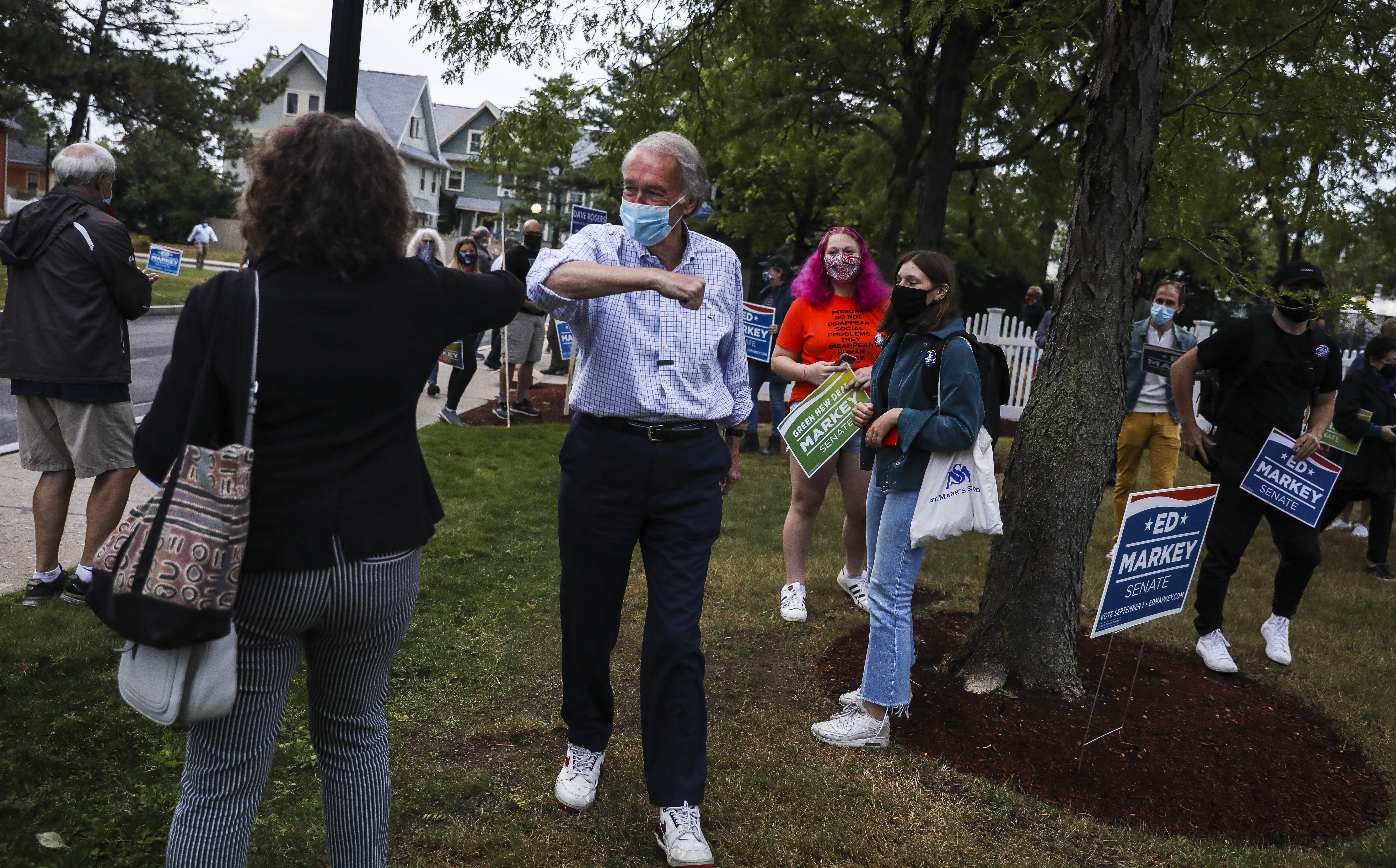 Ed Markey bumped elbows with supporters in Cambridge on Thursday.