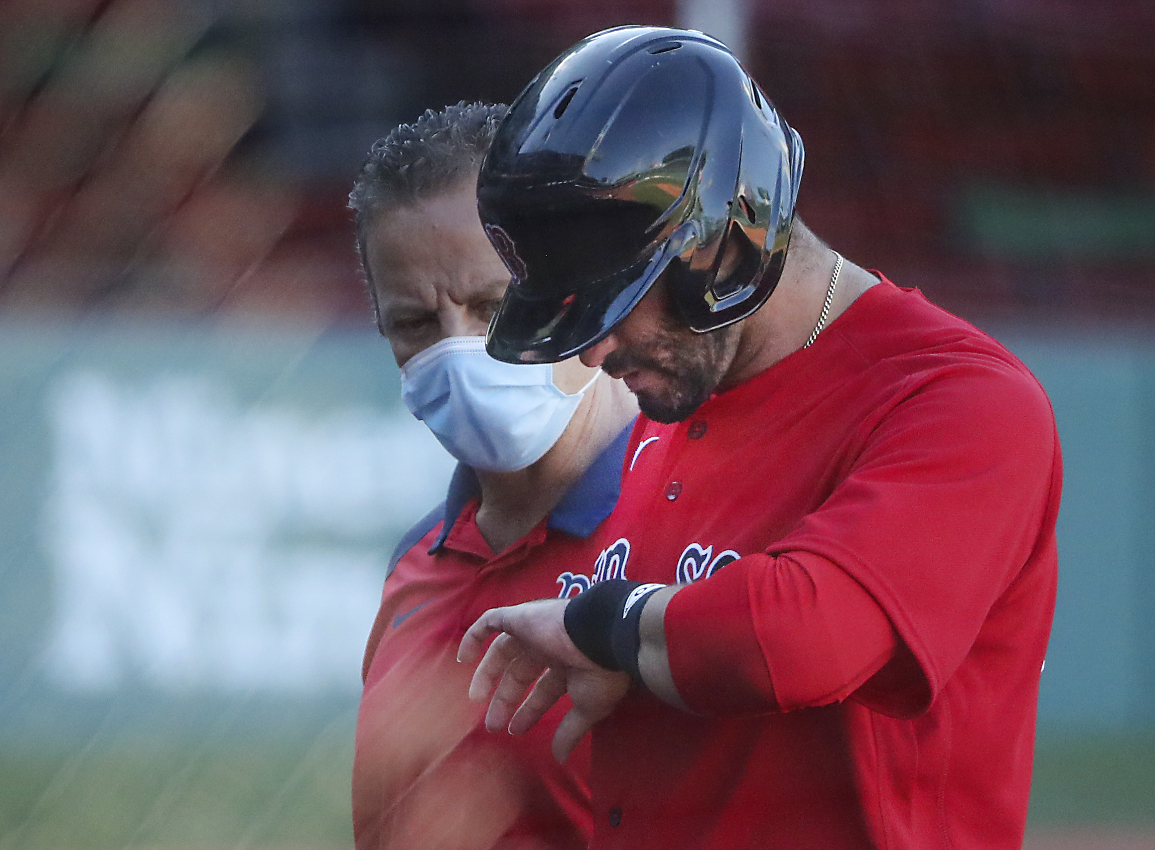 J.D. Martinez walks off the field after getting hit by a pitch during a recent game against Washington.