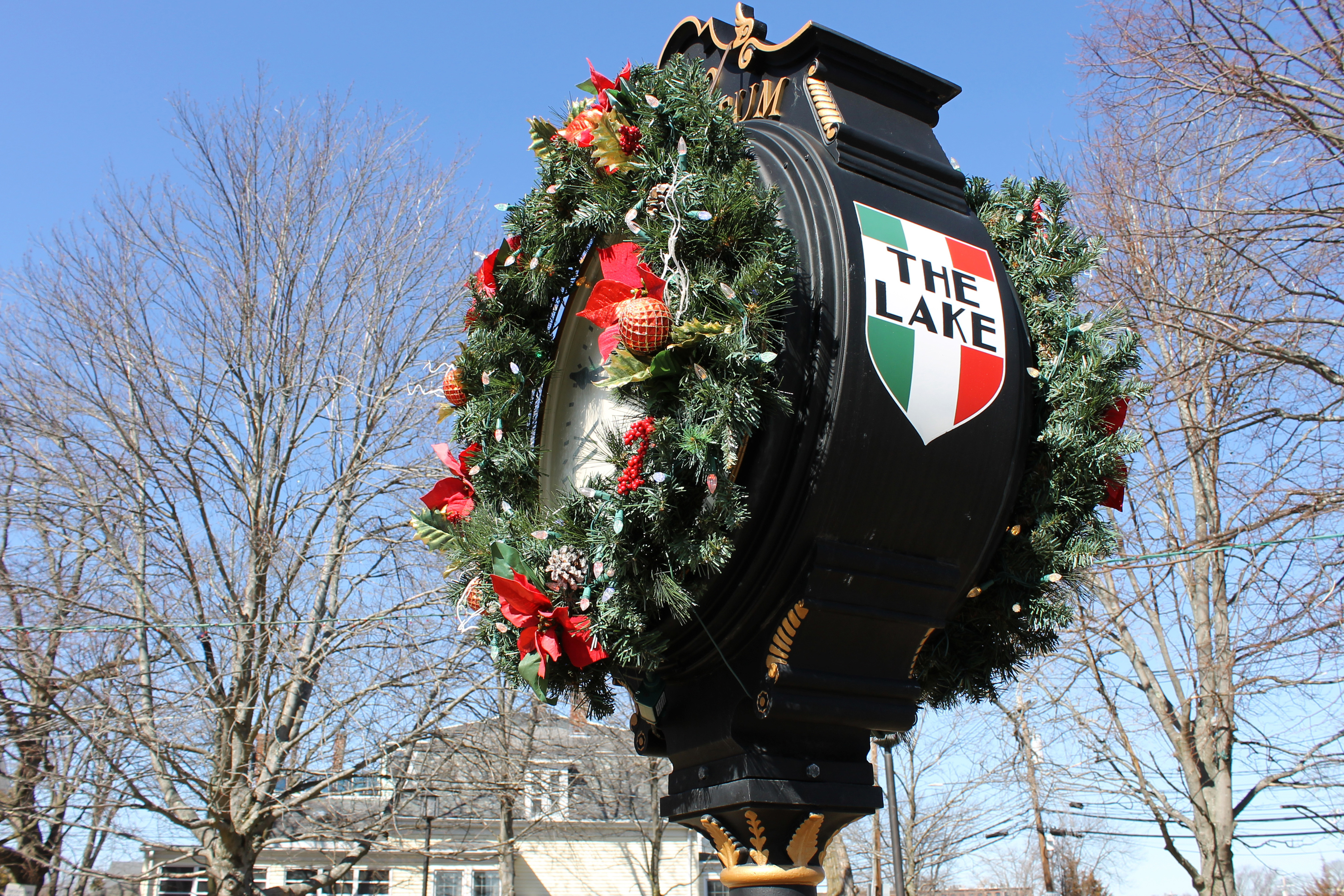 A Christmas wreath adorns the Nonantum town clock on Monday at Coletti-Magni Park at Bridge and Watertown streets in Newton.