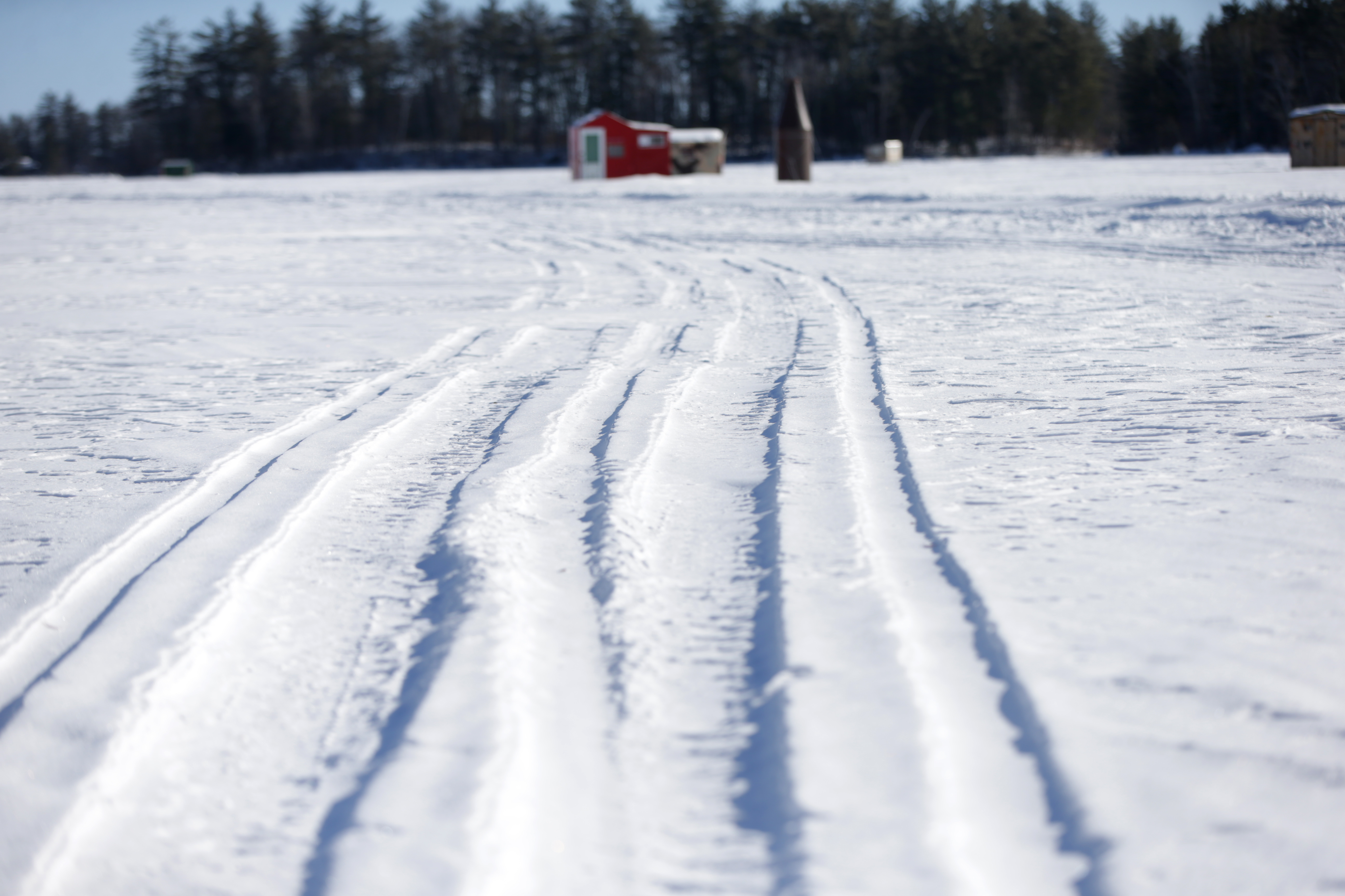Snowmobile tracks on Lake Winnipesaukee.