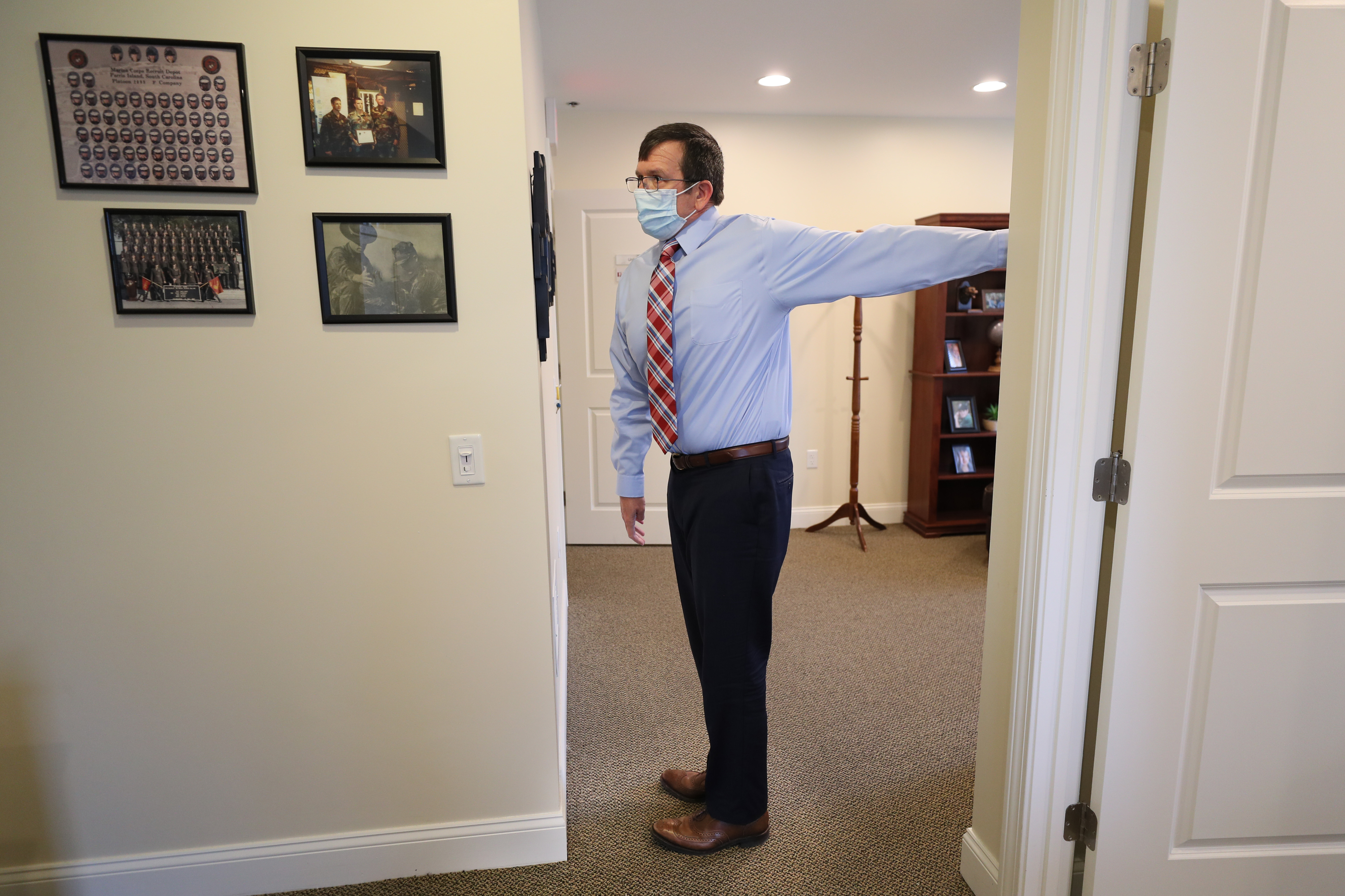Bob Beese, now back in his regular work office, did some stretching he learned from physical therapist.