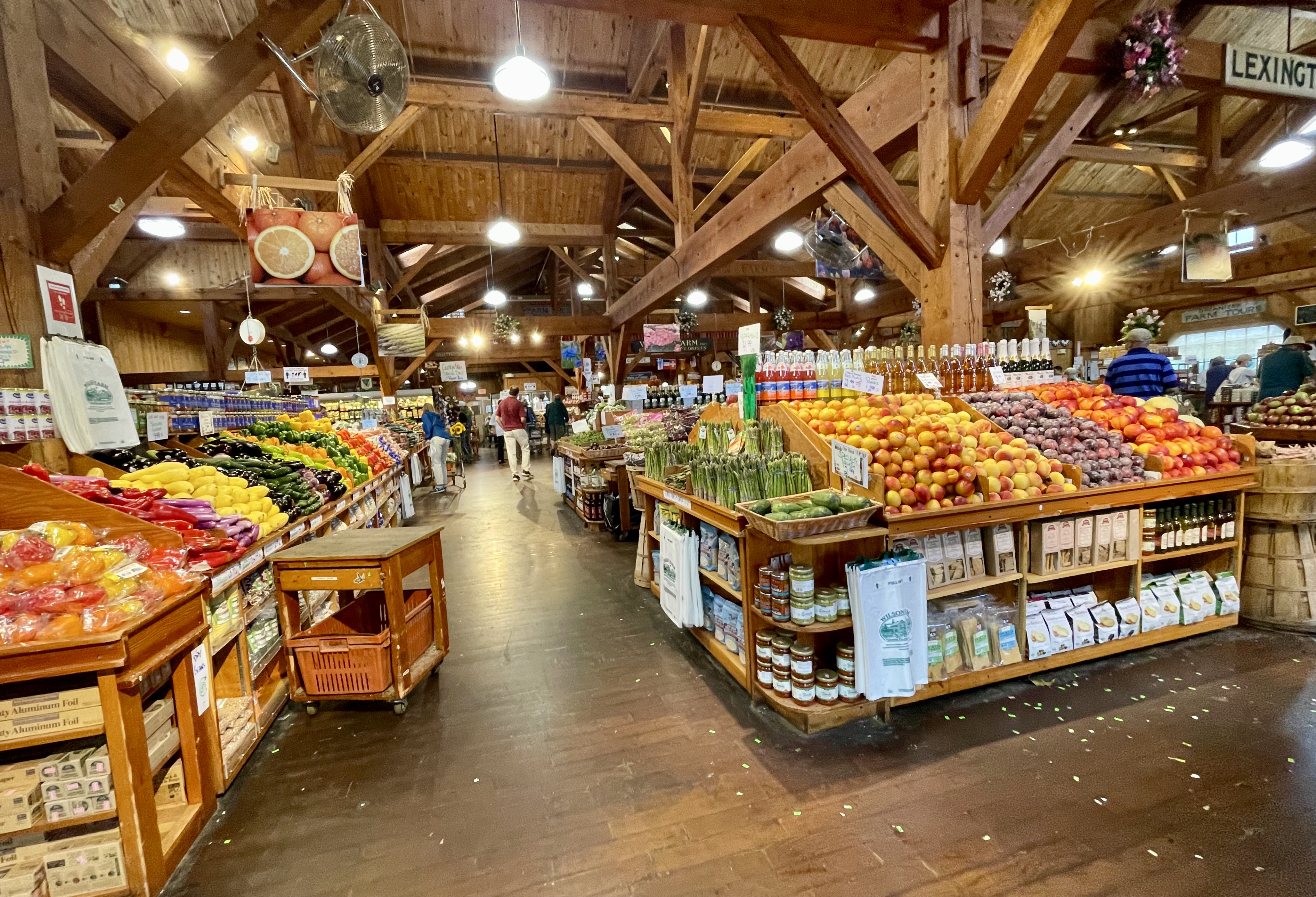 Wilson Farm in Lexington has a style similar to Russo’s in Watertown: Large wooden bins of ample produce and, underneath, densely packed display shelves. The farm stand building offers imported and domestic cheese, seafood, butcher meat cuts, and prepared food. A large parking lot is on site.
