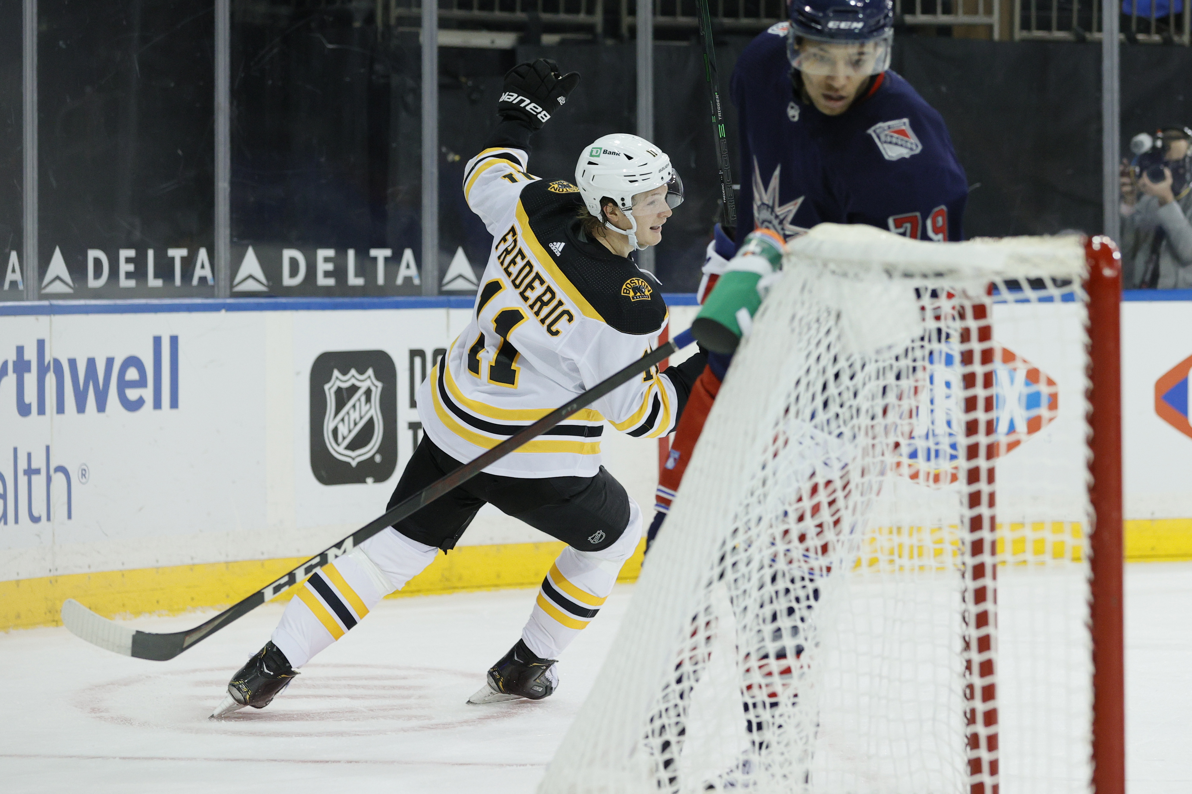 Trent Frederic celebrates his goal, which gave the Bruins a two-goal lead heading into the first intermission on their way to a 4-1 victory.