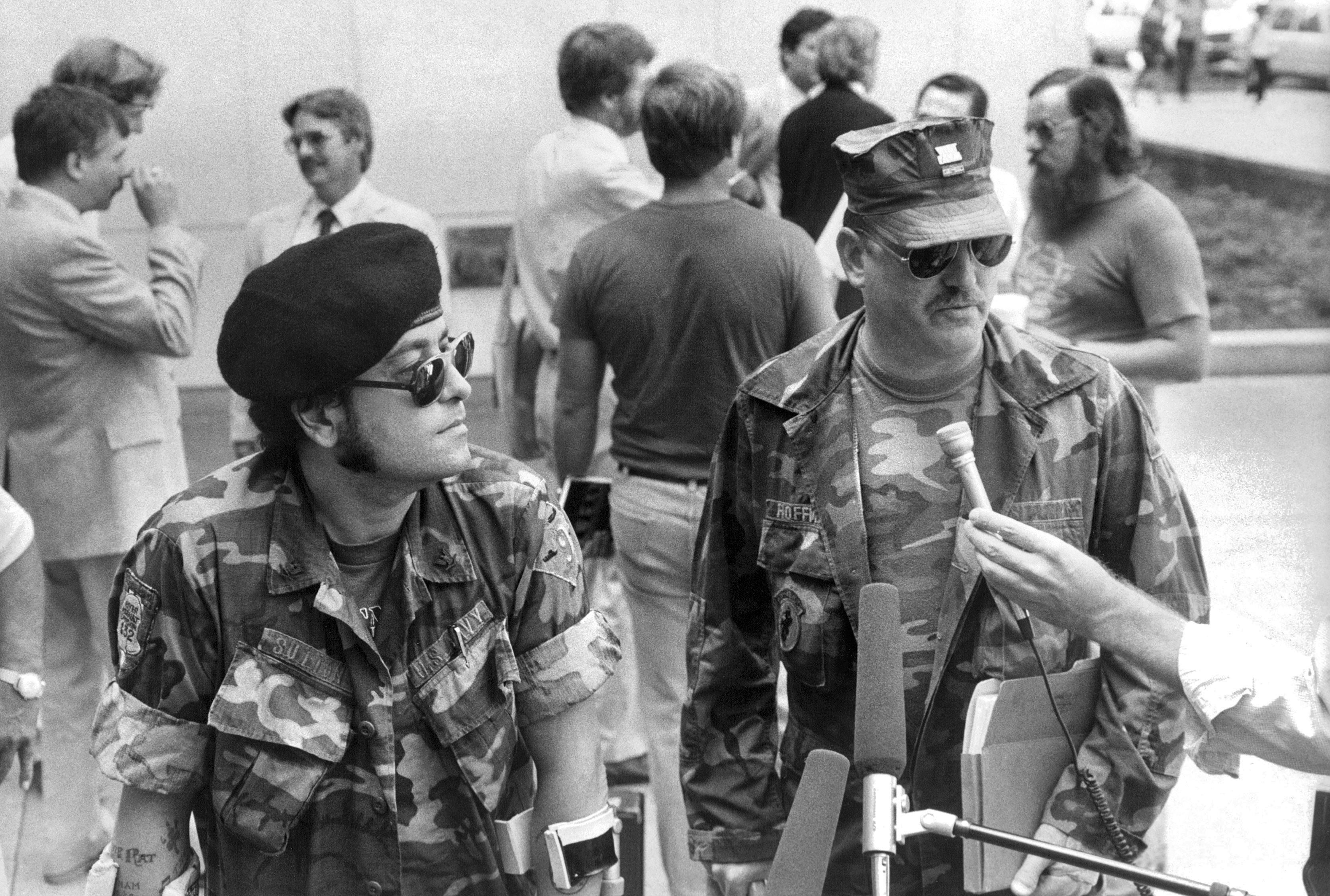 Two Vietnam War veterans, Bobby Sutton (left) and Louis Huffman, spoke outside federal court in Brooklyn as Judge Jack Weinstein presided over a class-action suit by veterans who had been sickened by the military's use of the herbicide Agent Orange during the war.