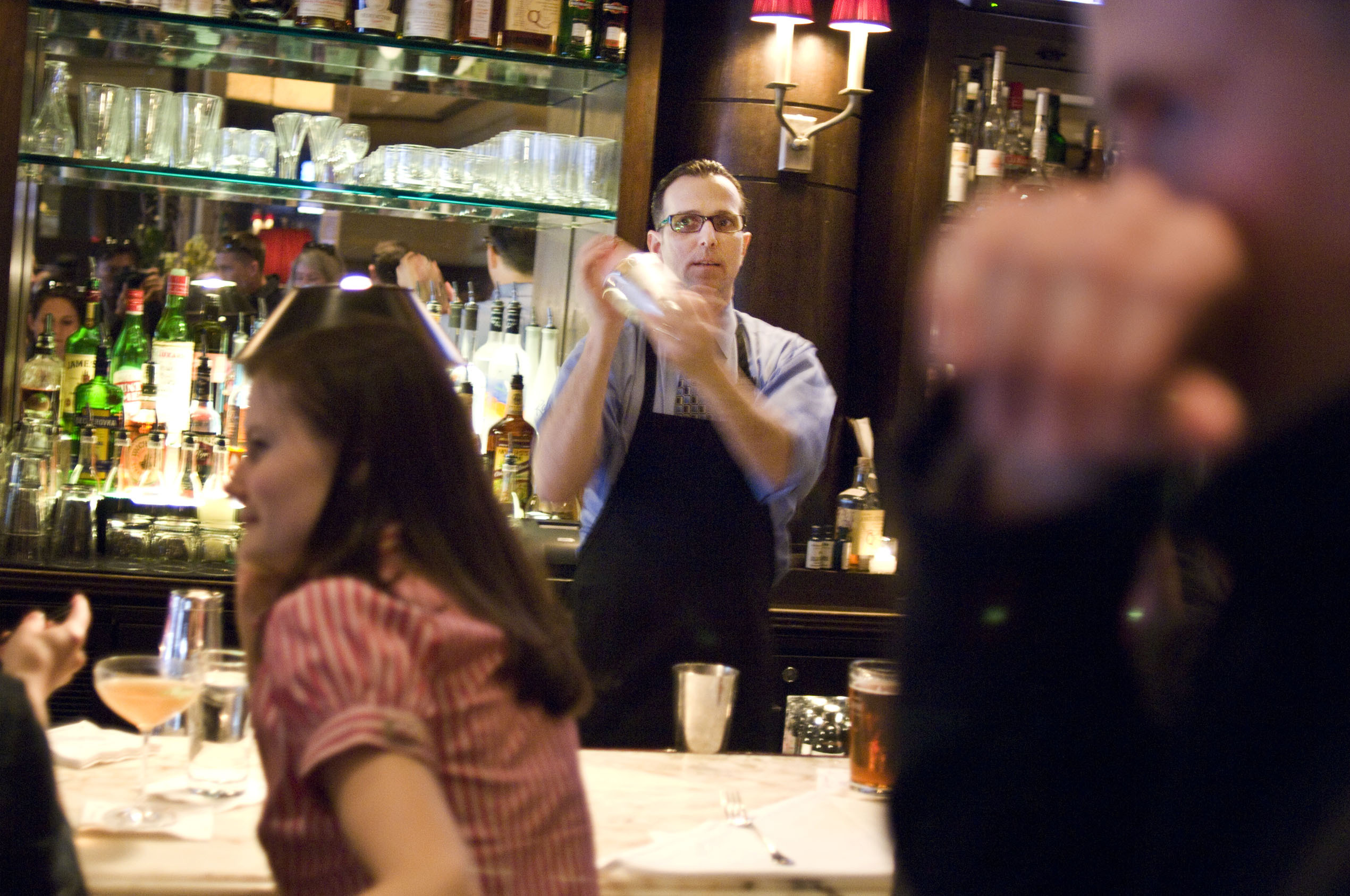 Before COVID-19, the bar at Eastern Standard was crowded most nights, like this one (in 2008) when Cannon was mixing cocktails.