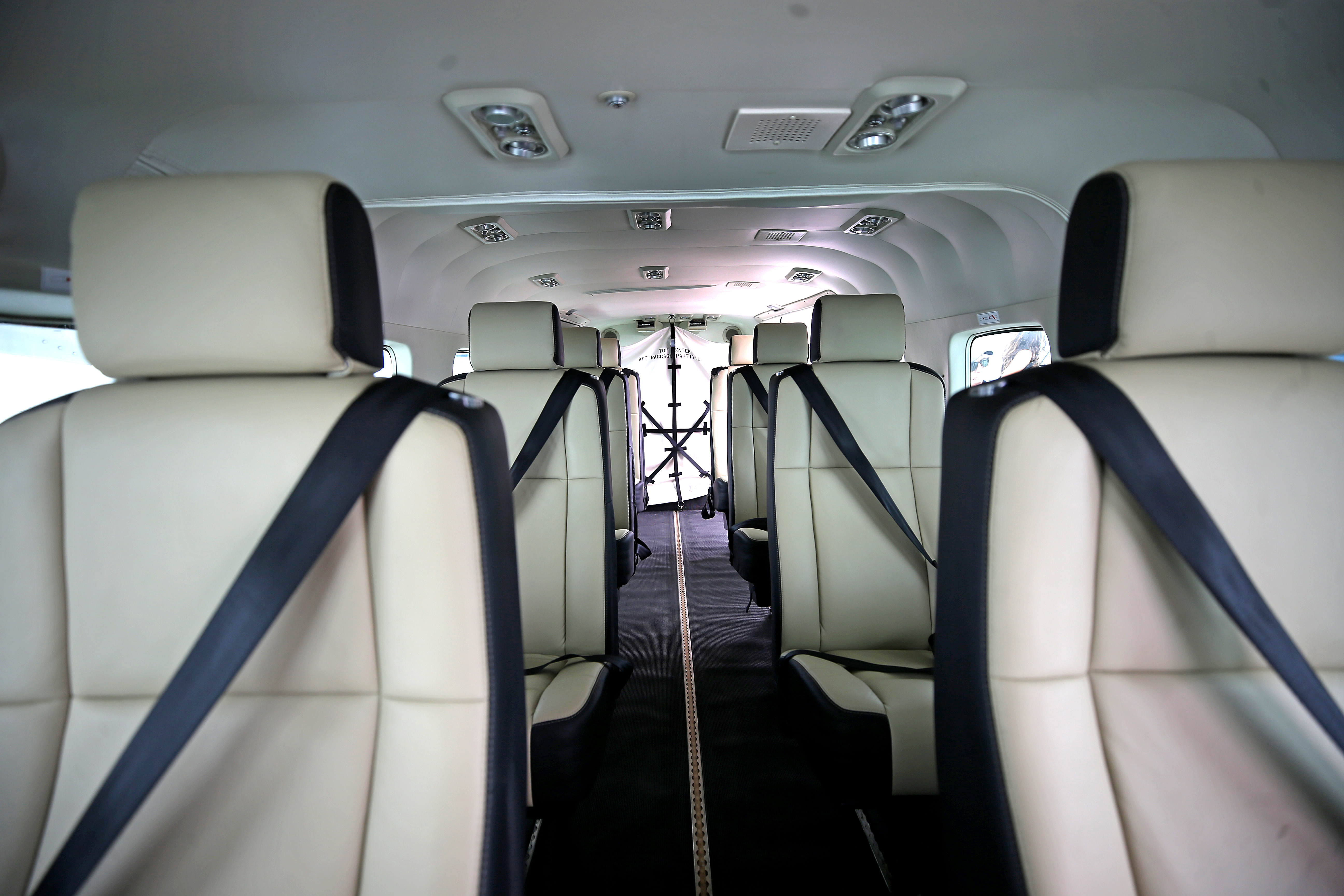 An interior view of the passenger seating area of the seaplane.