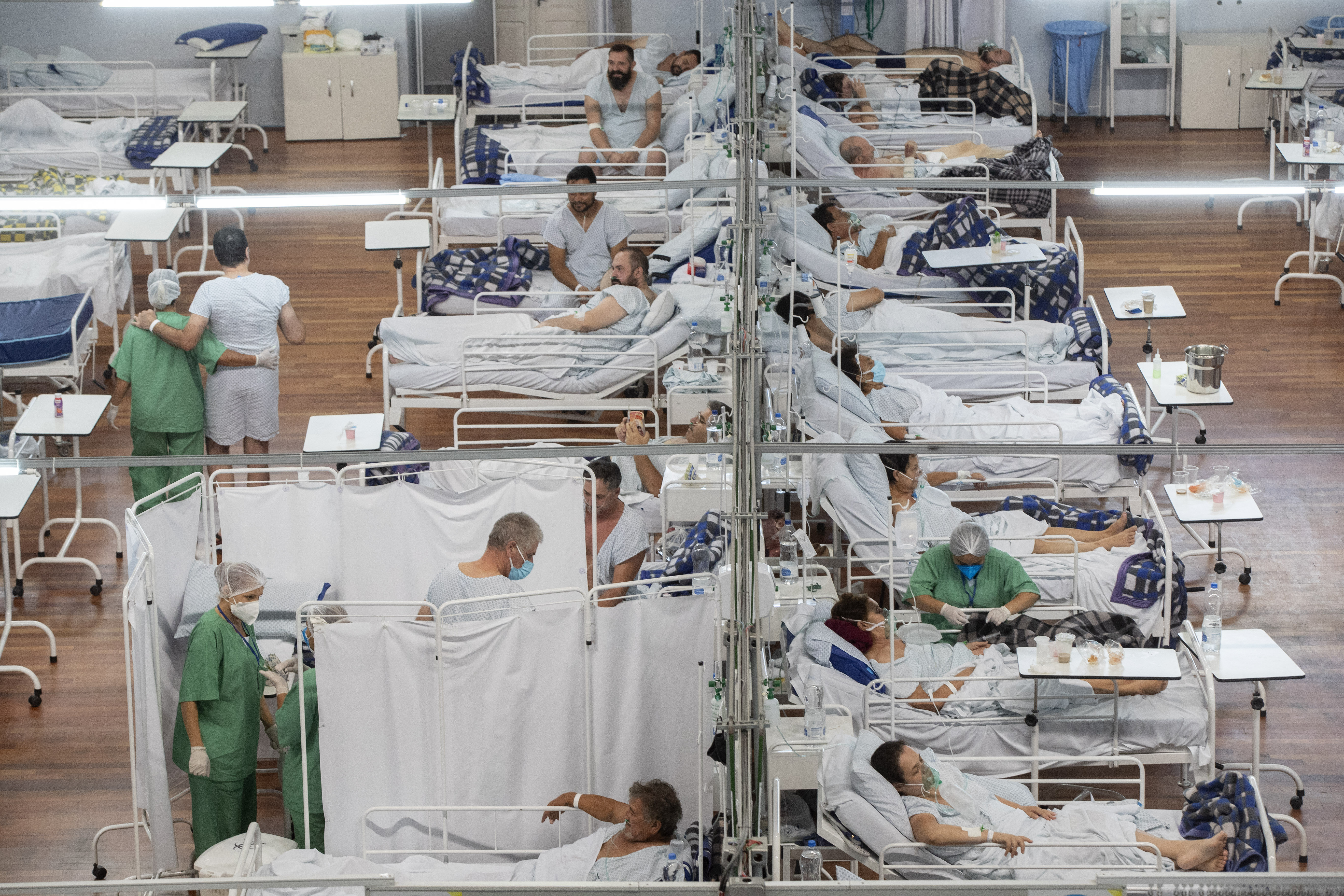 Patients rested in a field hospital built inside a sports coliseum in Santo Andre, on the outskirts of Sao Paulo, Brazil, in March.