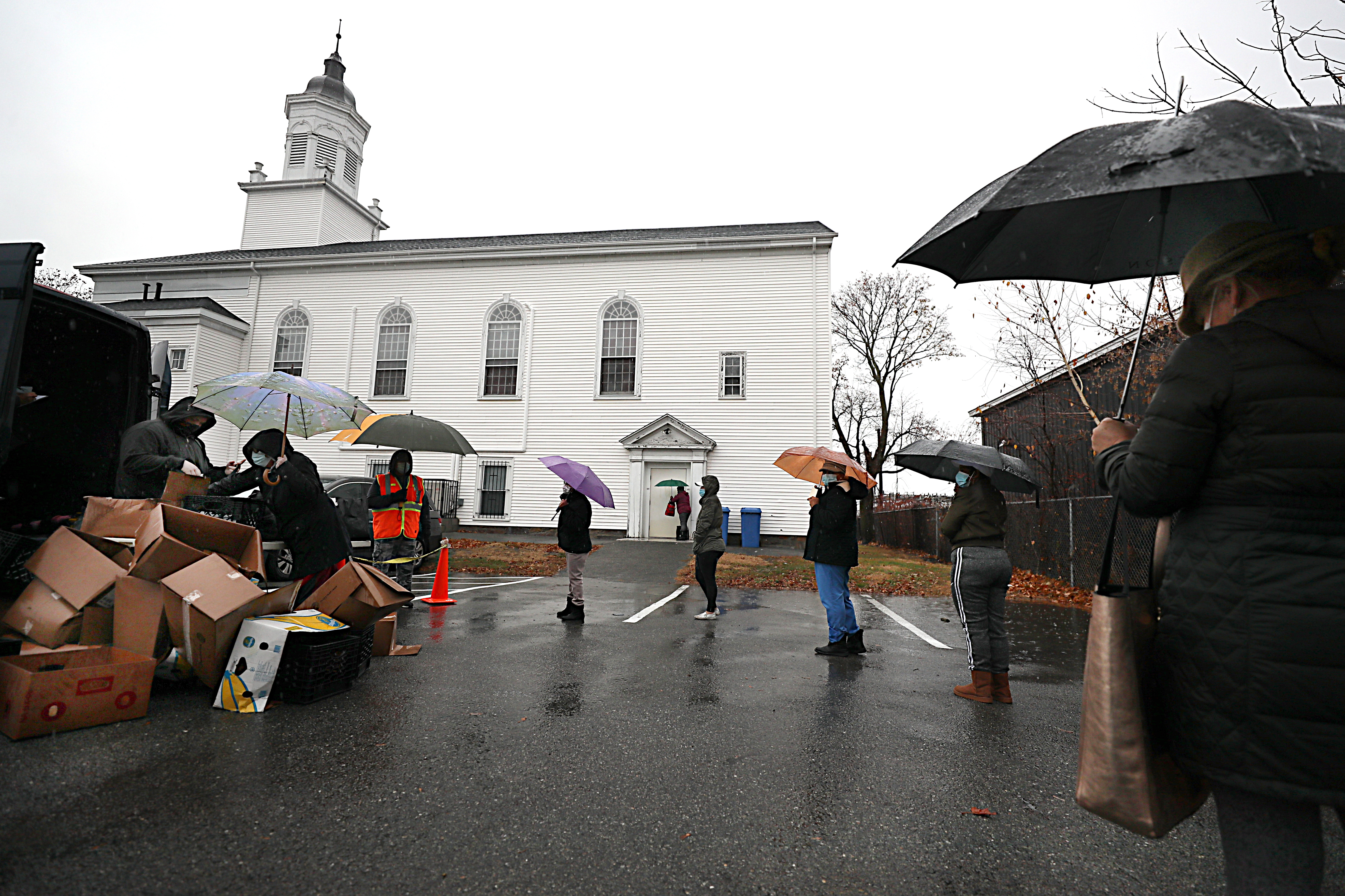 Besides the line, people had to contend with the rain at a food distribution site in Lawrence.