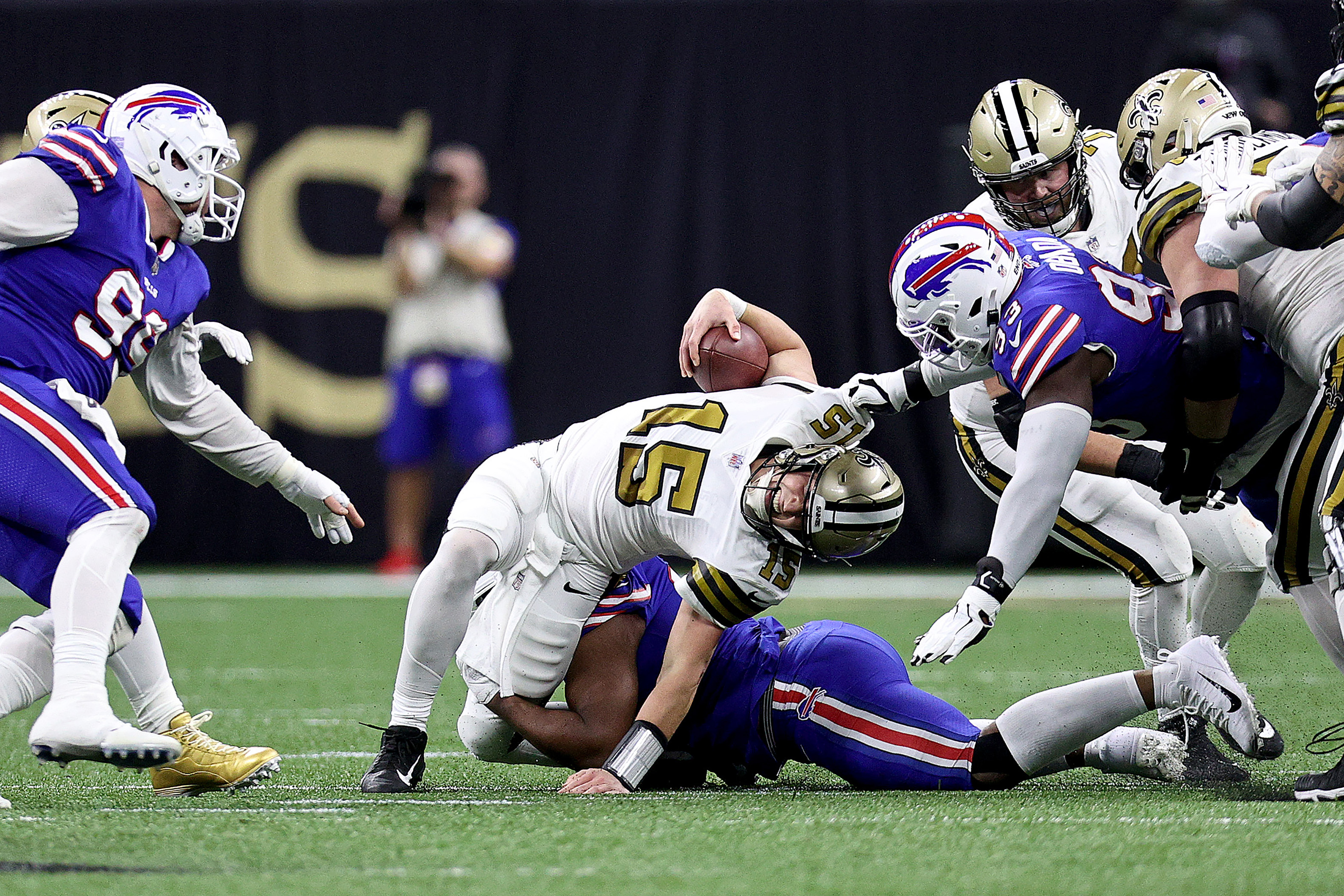 Saints quarterback Trevor Siemian is sacked by Buffalo's Ed Oliver in the second quarter of Thursday's game.