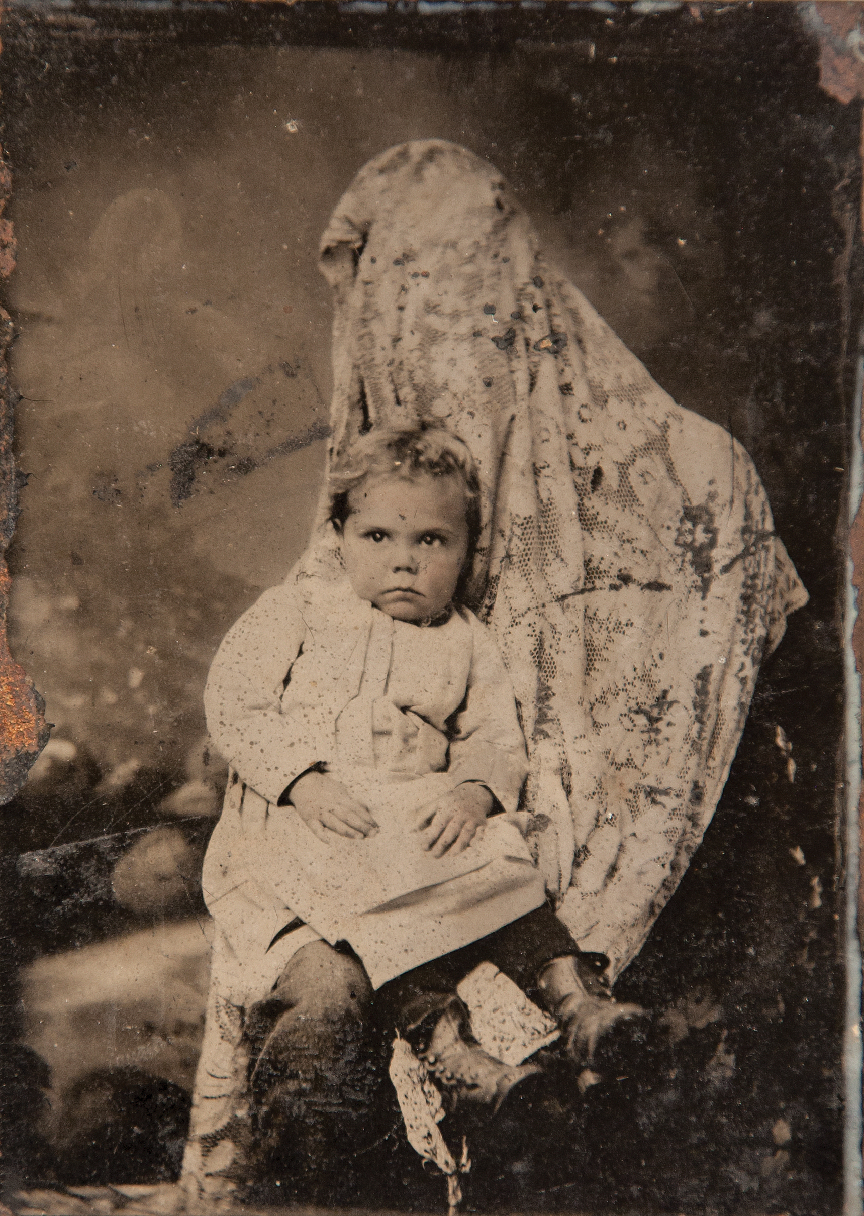 Fabrics such as drapes, tablecloths, and veils were often used to conceal caregivers.