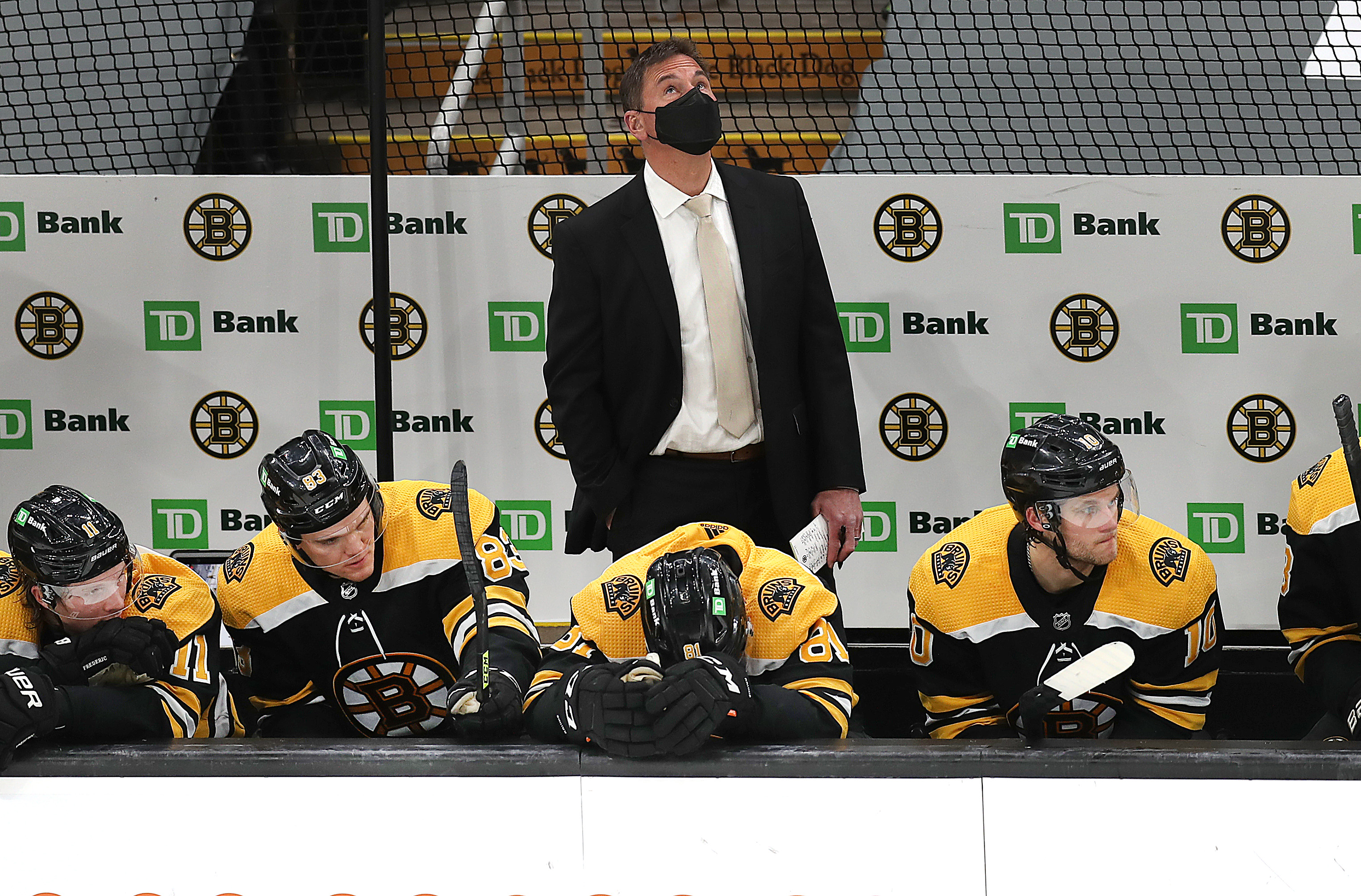 The Bruins' bench looks downcast with seconds left in Thursday's loss to the Penguins.