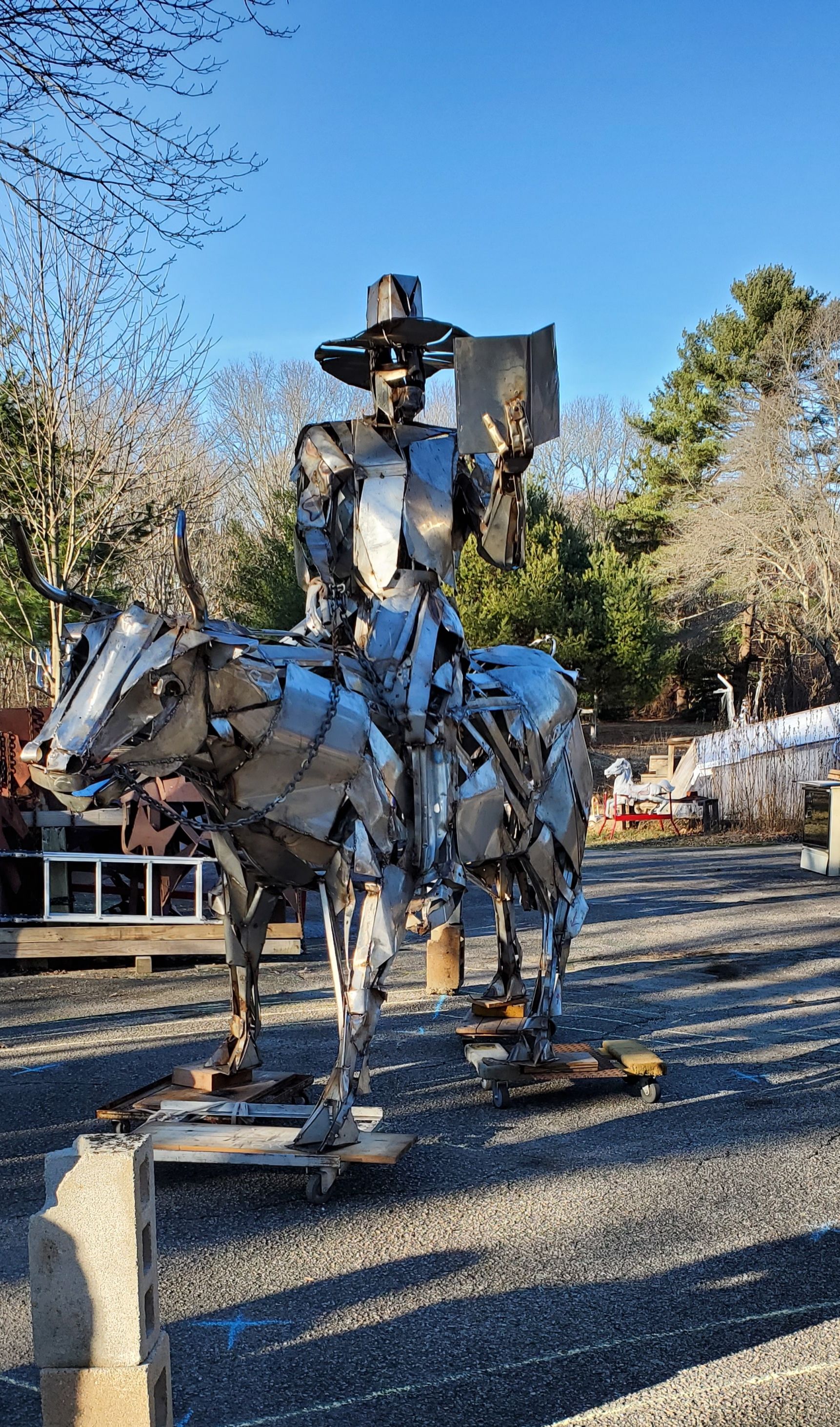 The 14-foot stainless steel sculpture of William Blackstone astride his white bull was done by Peruko Ccopacatty, a Peruvian-born sculptor based in Rhode Island.