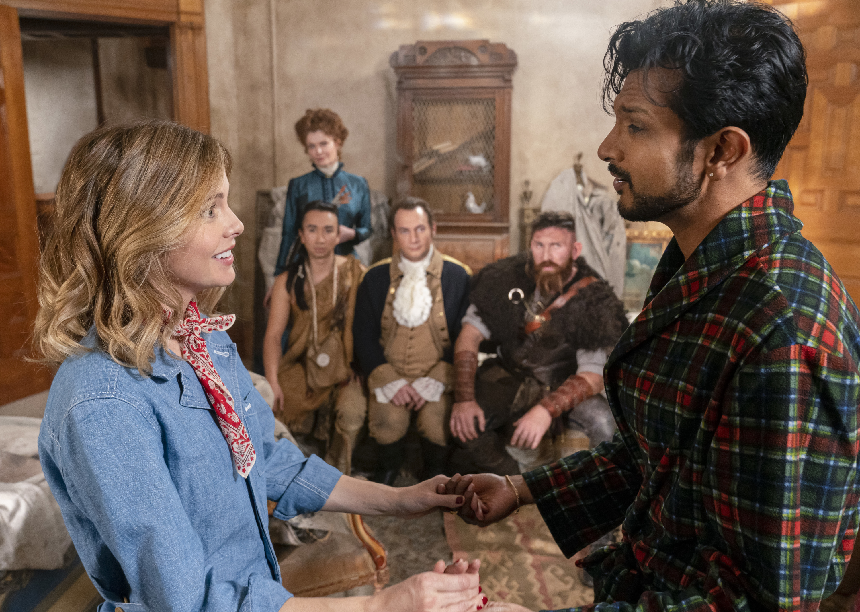 From left: Rose McIver, Rebecca Wisocky, Román Zaragoza, Brandon Scott Jones, Devan Chandler Long, and Utkarsh Ambudkar in the CBS sitcom "Ghosts."