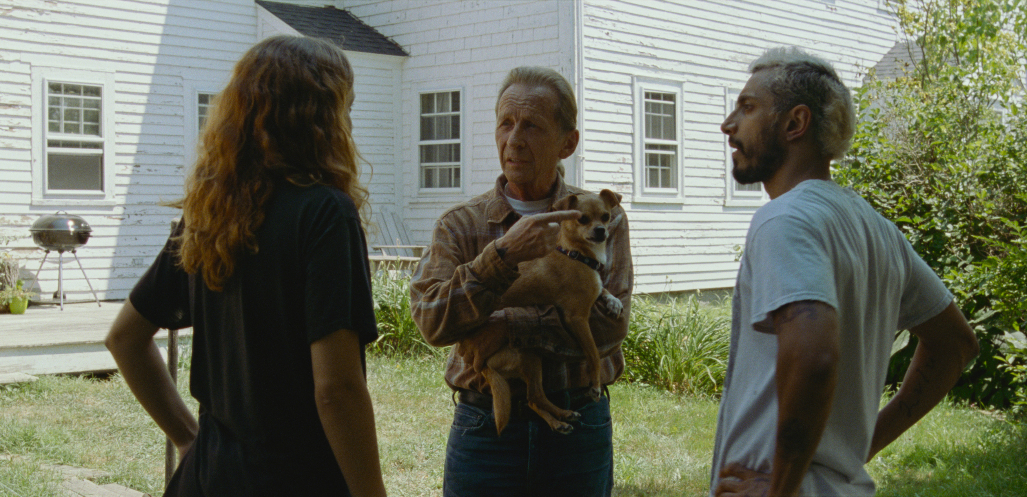 Olivia Cooke, Paul Raci, center, and Riz Ahmed in "Sound of Metal."
