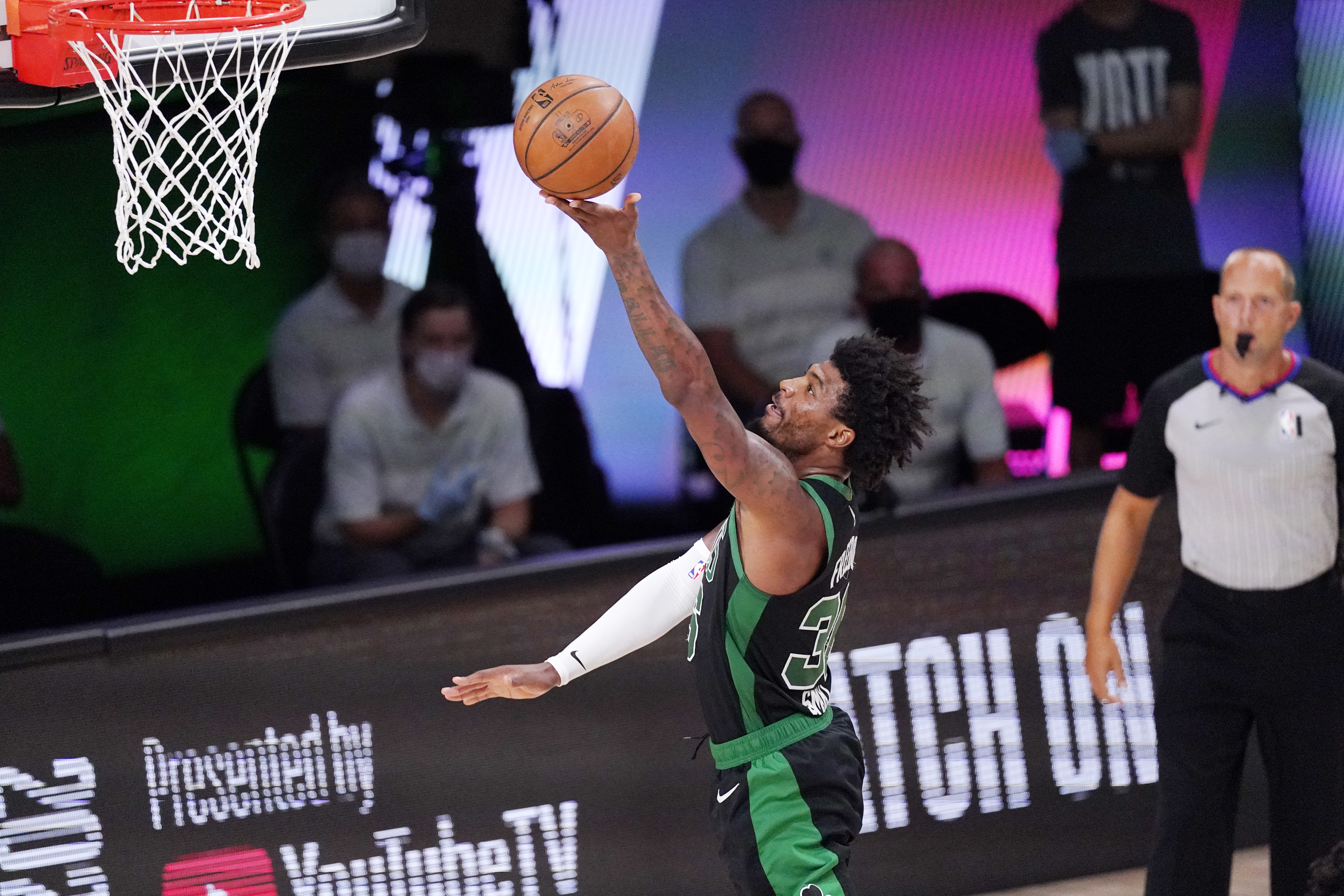 Marcus Smart goes to the basket in a playoff contest against Miami.