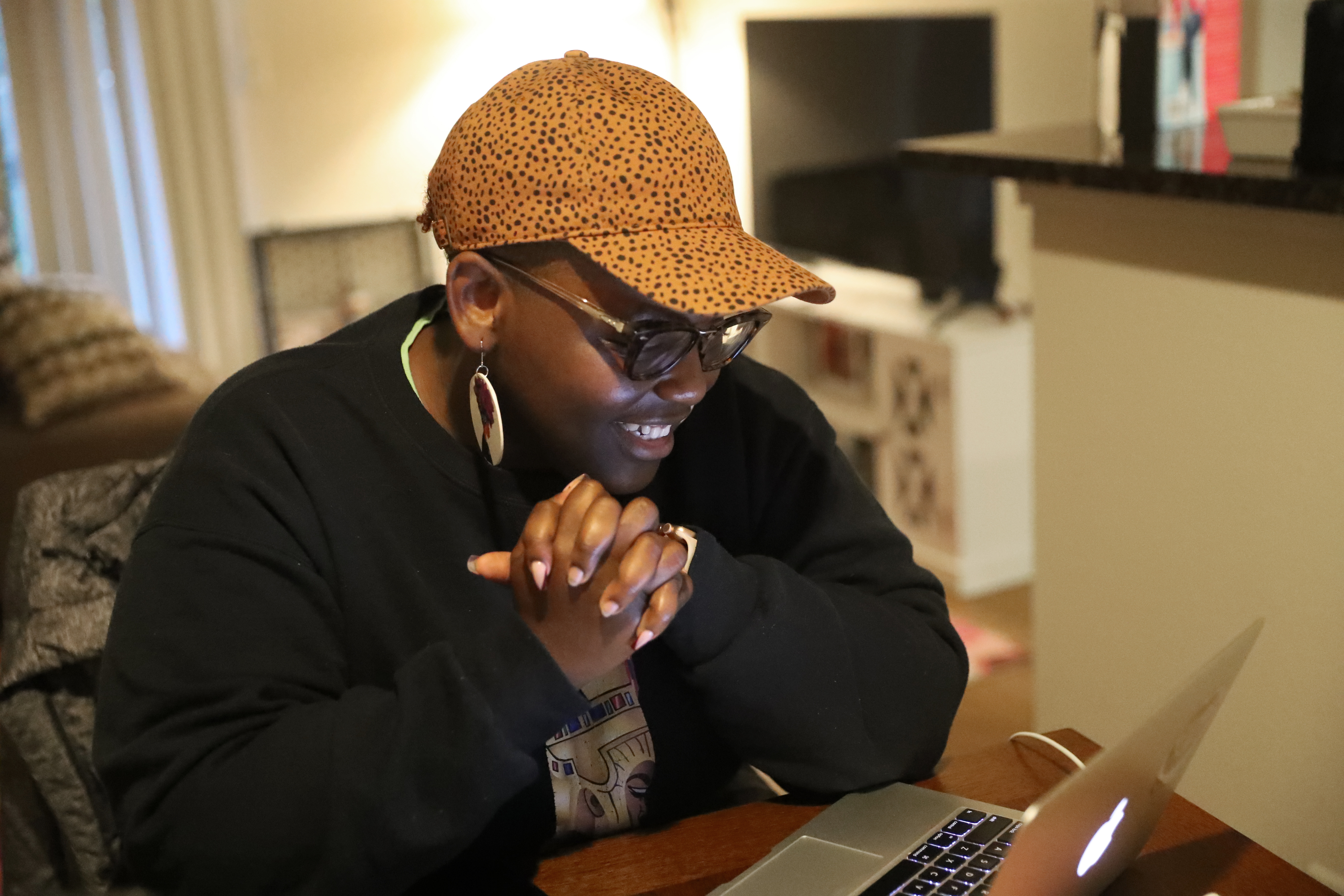 Adrianna Barnes spoke with a student, using her computer.