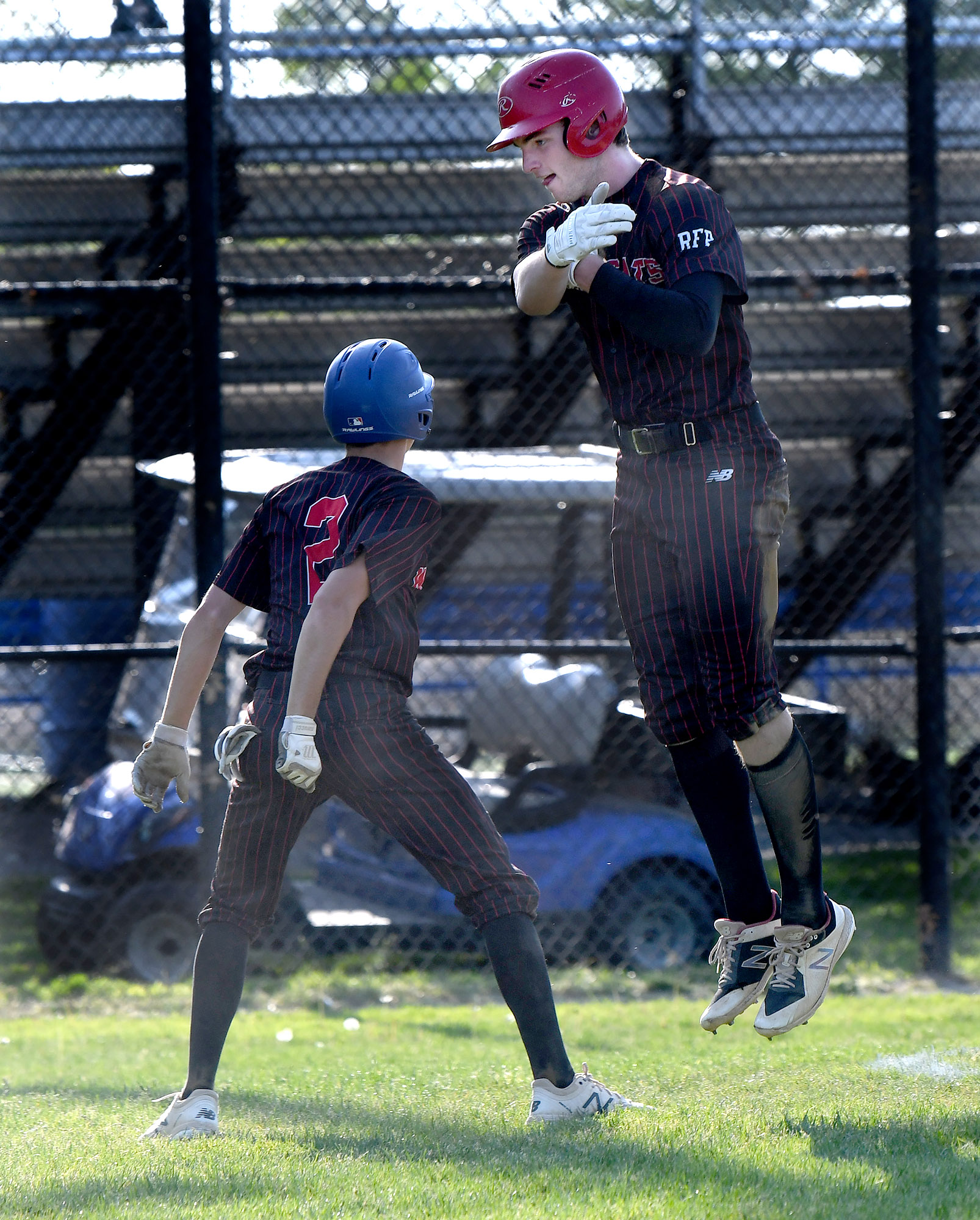 Milton's Graham O'Donnell (right) with teammate Ryan Kelly after scoring.