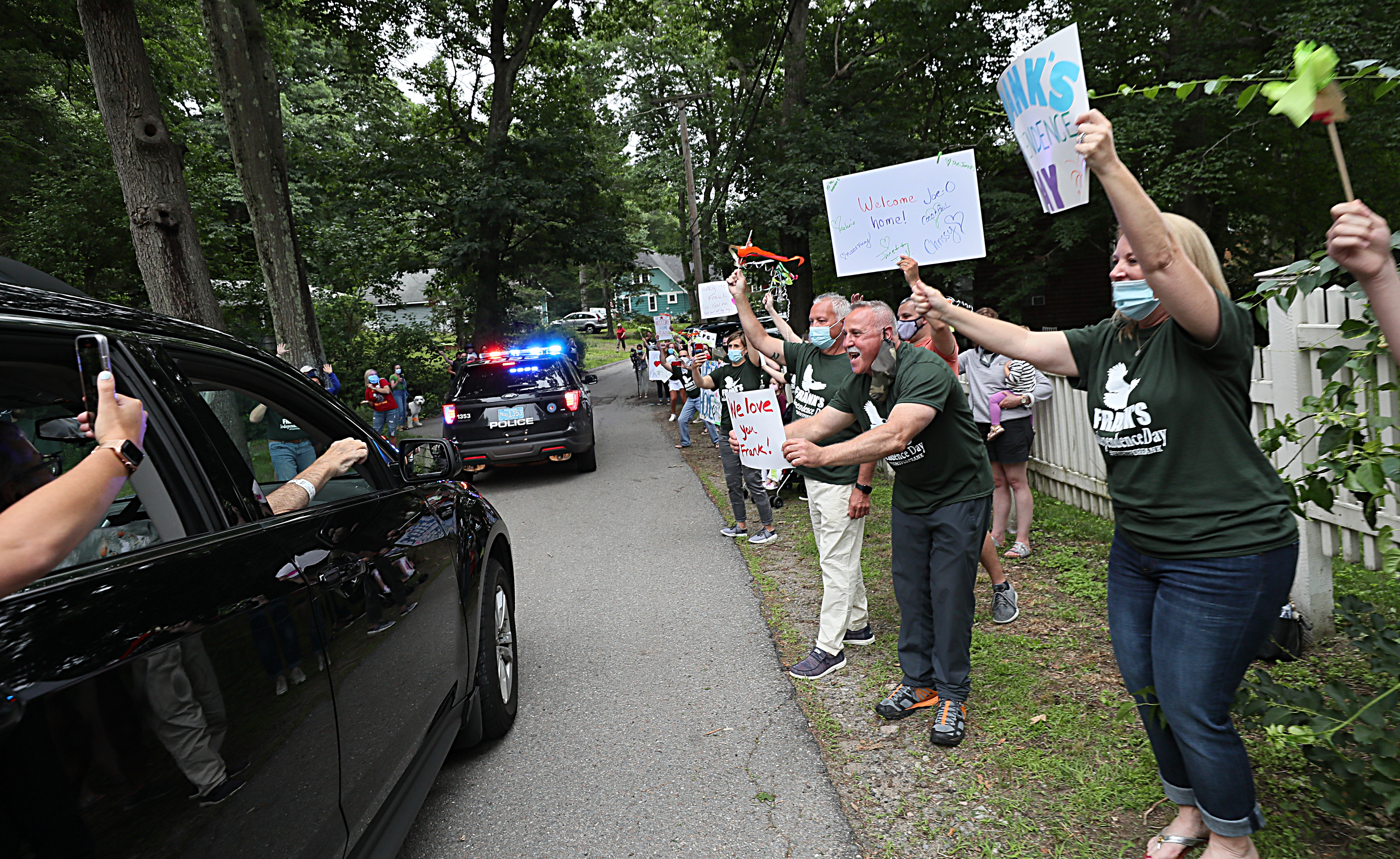 Hundreds of friends and neighbors greeted Frank Cutitta as he arrived home in Wayland.