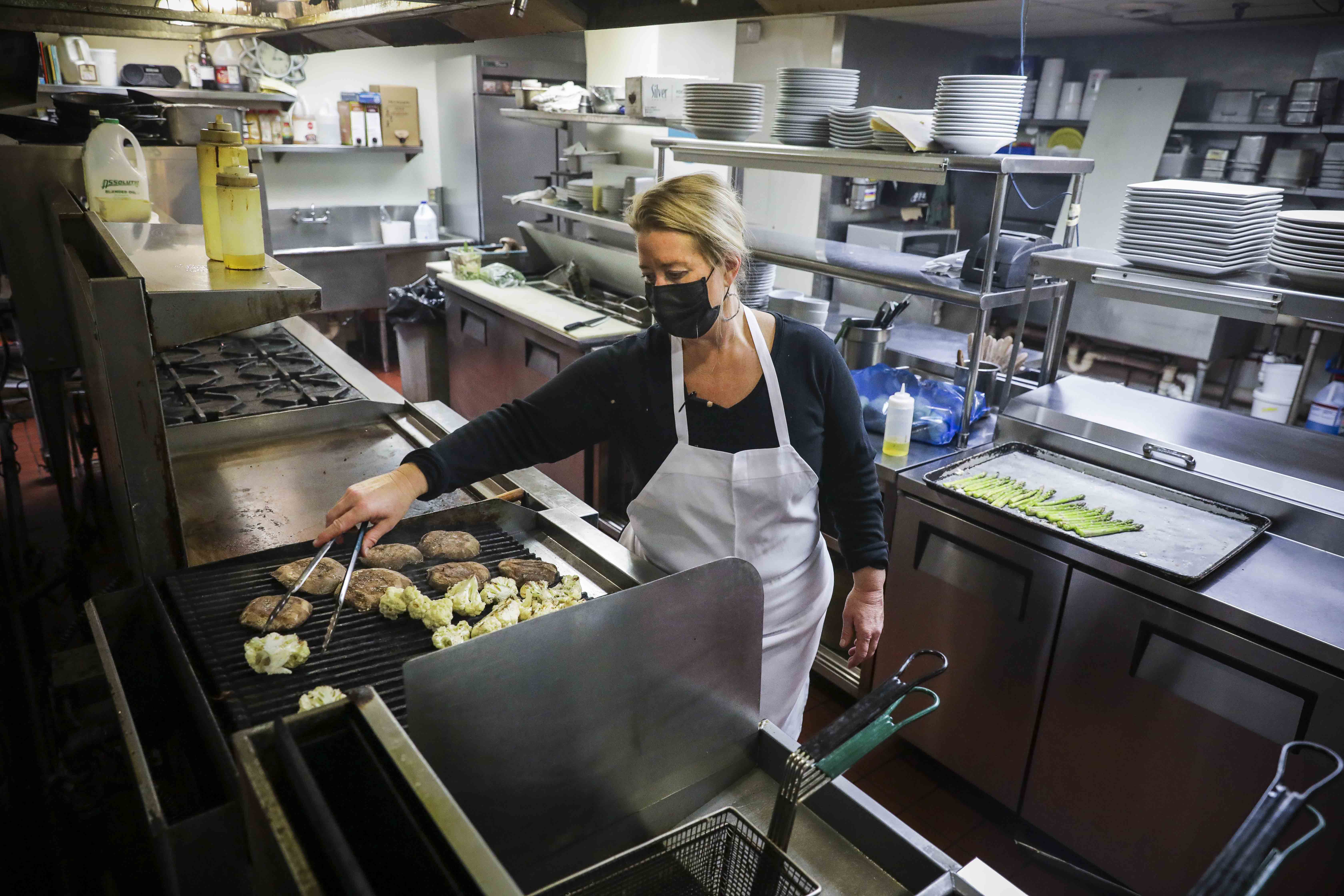 Heather LaRou, owner of Snow Squall Restaurant in South Portland, prepared food.